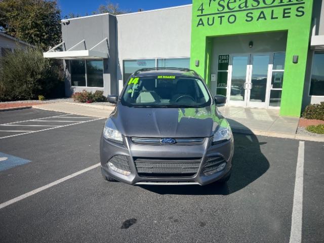 2014 Sterling Gray Metallic /Medium Light Stone Ford Escape SE (1FMCU9GX2EU) with an EcoBoost 1.6L I-4 gasoline direct injection engine, Automatic transmission, located at 940 North Main Street, Cedar City, UT, 84720, (435) 628-0023, 37.692936, -113.061897 - We specialize in helping ALL people get the best financing available. No matter your credit score, good, bad or none we can get you an amazing rate. Had a bankruptcy, divorce, or repossessions? We give you the green light to get your credit back on the road. Low down and affordable payments that fit - Photo#1