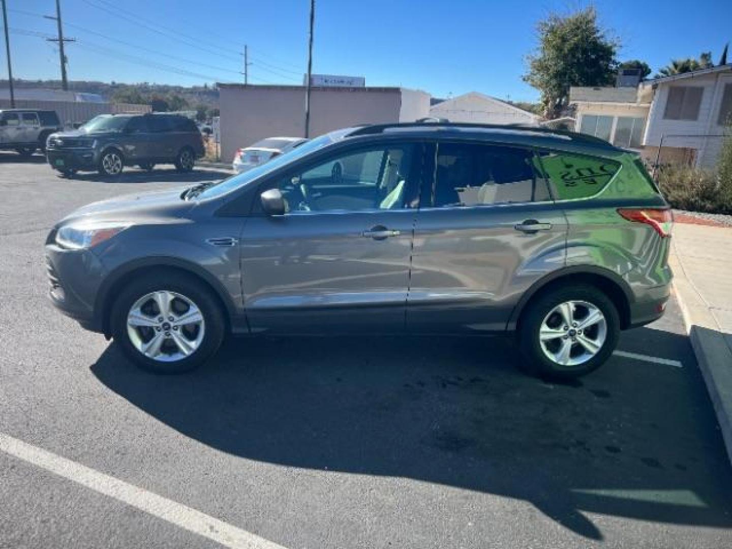 2014 Sterling Gray Metallic /Medium Light Stone Ford Escape SE (1FMCU9GX2EU) with an EcoBoost 1.6L I-4 gasoline direct injection engine, Automatic transmission, located at 1865 East Red Hills Pkwy, St. George, 84770, (435) 628-0023, 37.120850, -113.543640 - We specialize in helping ALL people get the best financing available. No matter your credit score, good, bad or none we can get you an amazing rate. Had a bankruptcy, divorce, or repossessions? We give you the green light to get your credit back on the road. Low down and affordable payments that fit - Photo#3