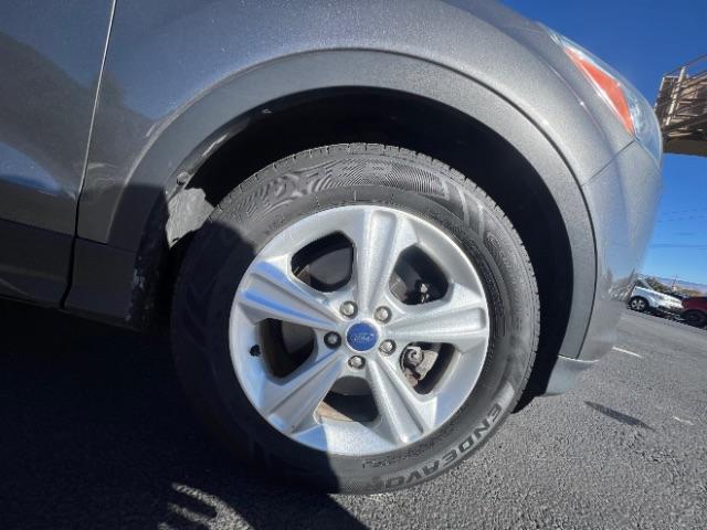 2014 Sterling Gray Metallic /Medium Light Stone Ford Escape SE (1FMCU9GX2EU) with an EcoBoost 1.6L I-4 gasoline direct injection engine, Automatic transmission, located at 940 North Main Street, Cedar City, UT, 84720, (435) 628-0023, 37.692936, -113.061897 - We specialize in helping ALL people get the best financing available. No matter your credit score, good, bad or none we can get you an amazing rate. Had a bankruptcy, divorce, or repossessions? We give you the green light to get your credit back on the road. Low down and affordable payments that fit - Photo#8