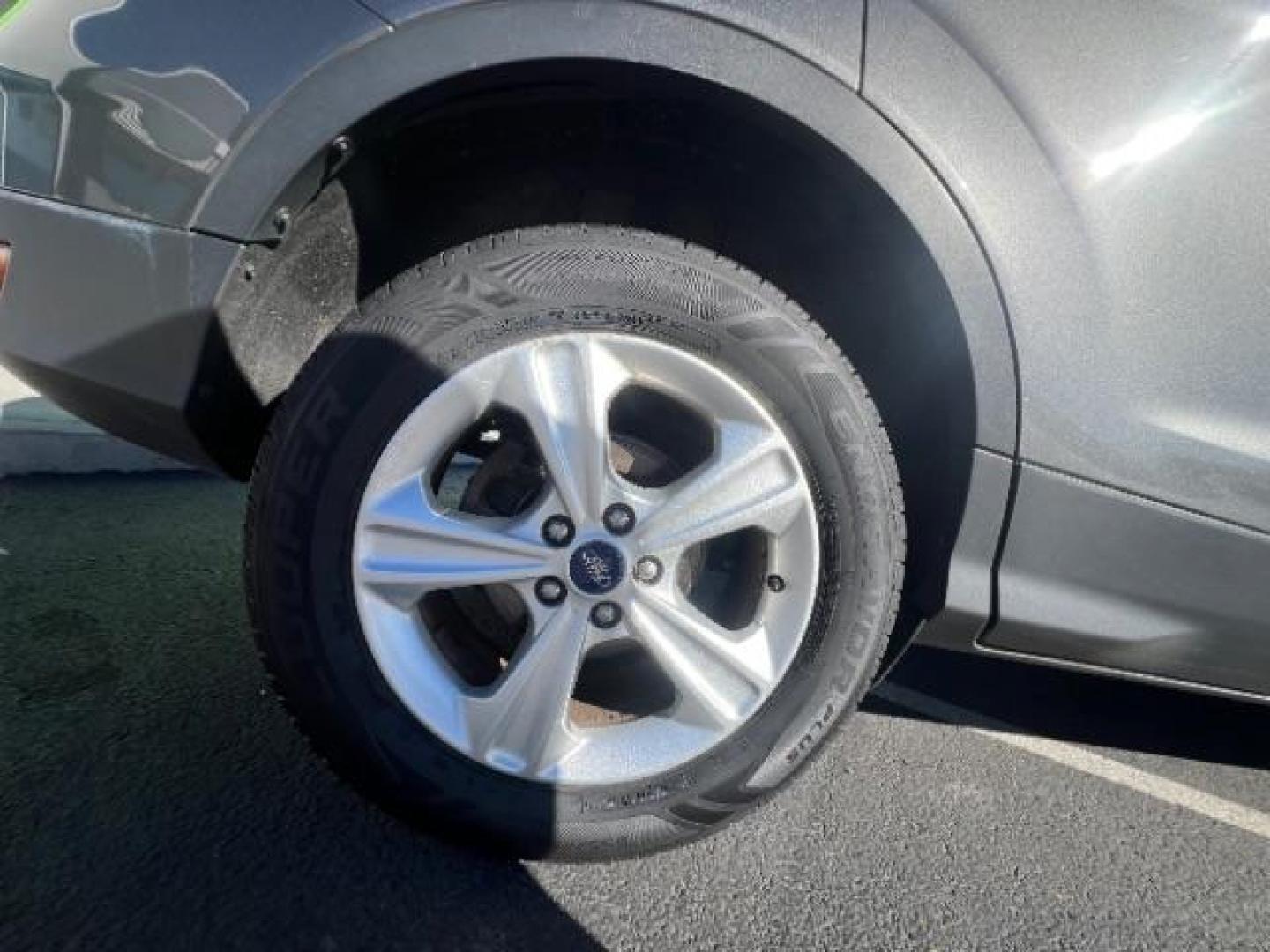 2014 Sterling Gray Metallic /Medium Light Stone Ford Escape SE (1FMCU9GX2EU) with an EcoBoost 1.6L I-4 gasoline direct injection engine, Automatic transmission, located at 1865 East Red Hills Pkwy, St. George, 84770, (435) 628-0023, 37.120850, -113.543640 - We specialize in helping ALL people get the best financing available. No matter your credit score, good, bad or none we can get you an amazing rate. Had a bankruptcy, divorce, or repossessions? We give you the green light to get your credit back on the road. Low down and affordable payments that fit - Photo#11