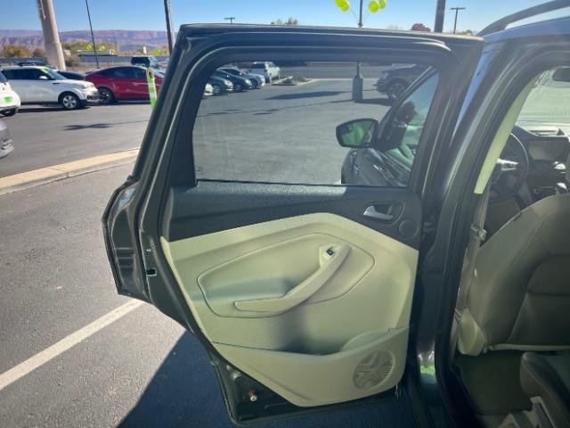 2014 Sterling Gray Metallic /Medium Light Stone Ford Escape SE (1FMCU9GX2EU) with an EcoBoost 1.6L I-4 gasoline direct injection engine, Automatic transmission, located at 940 North Main Street, Cedar City, UT, 84720, (435) 628-0023, 37.692936, -113.061897 - We specialize in helping ALL people get the best financing available. No matter your credit score, good, bad or none we can get you an amazing rate. Had a bankruptcy, divorce, or repossessions? We give you the green light to get your credit back on the road. Low down and affordable payments that fit - Photo#20
