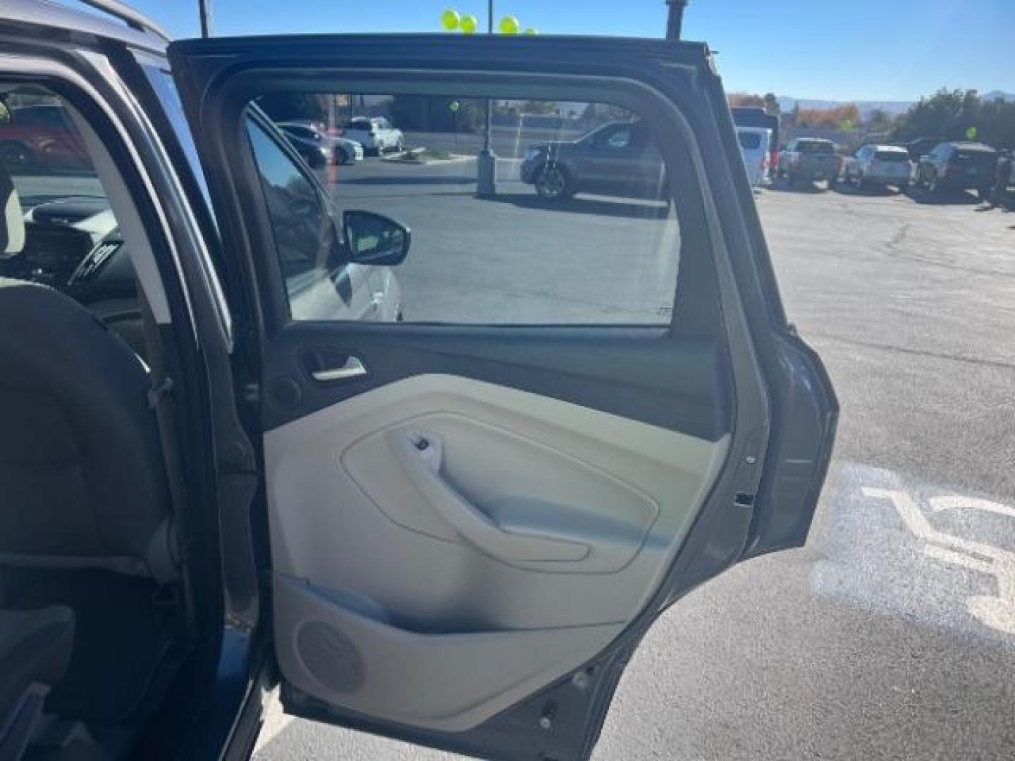 2014 Sterling Gray Metallic /Medium Light Stone Ford Escape SE (1FMCU9GX2EU) with an EcoBoost 1.6L I-4 gasoline direct injection engine, Automatic transmission, located at 1865 East Red Hills Pkwy, St. George, 84770, (435) 628-0023, 37.120850, -113.543640 - We specialize in helping ALL people get the best financing available. No matter your credit score, good, bad or none we can get you an amazing rate. Had a bankruptcy, divorce, or repossessions? We give you the green light to get your credit back on the road. Low down and affordable payments that fit - Photo#25