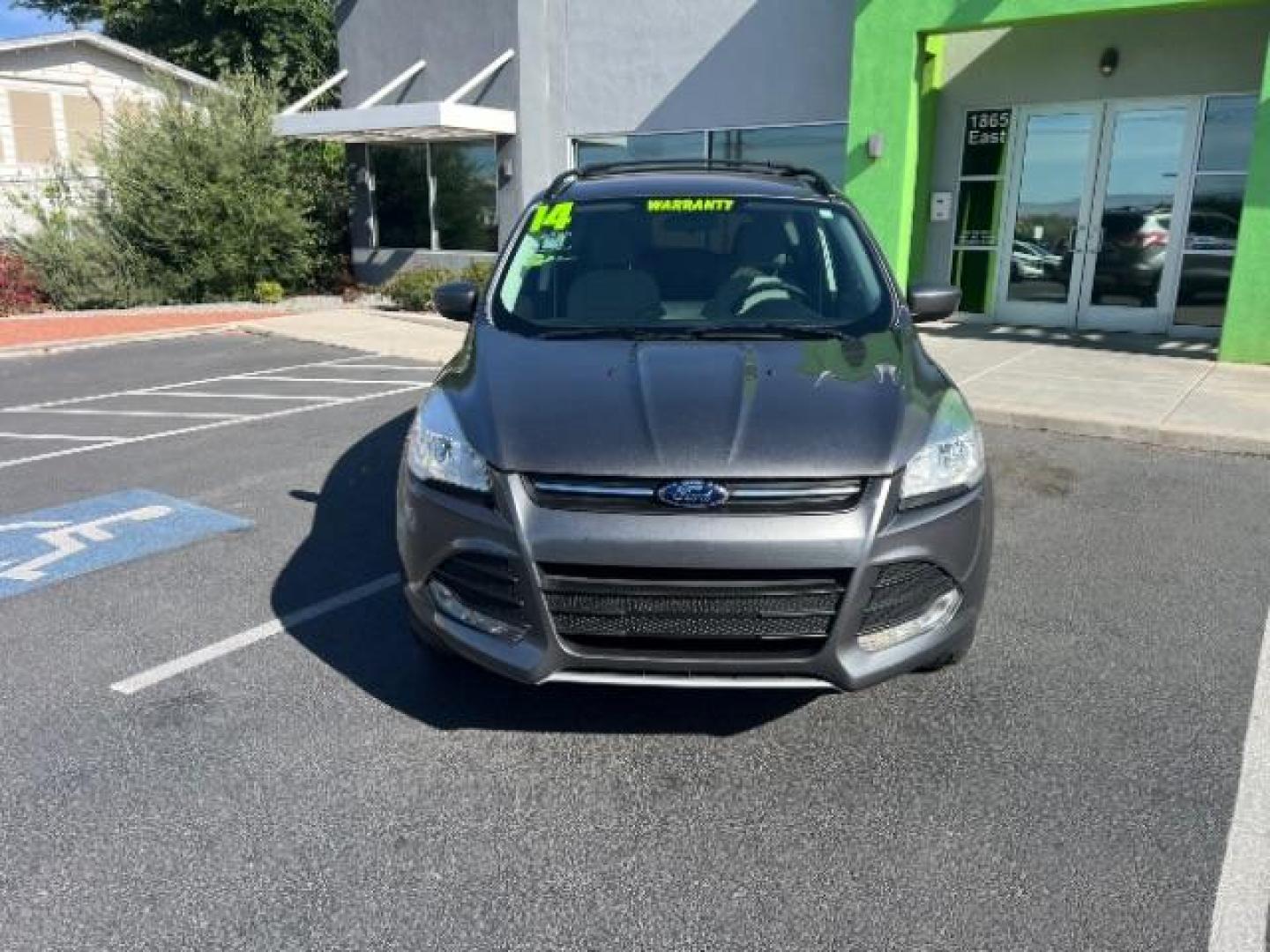 2014 Sterling Gray Metallic /Medium Light Stone Ford Escape SE (1FMCU9GX2EU) with an EcoBoost 1.6L I-4 gasoline direct injection engine, AUTOMATIC transmission, located at 940 North Main Street, Cedar City, UT, 84720, (435) 628-0023, 37.692936, -113.061897 - We specialize in helping ALL people get the best financing available. No matter your credit score, good, bad or none we can get you an amazing rate. Had a bankruptcy, divorce, or repossessions? We give you the green light to get your credit back on the road. Low down and affordable payments that fit- Photo#1