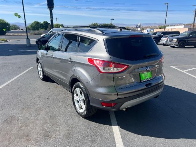 2014 Sterling Gray Metallic /Medium Light Stone Ford Escape SE (1FMCU9GX2EU) with an EcoBoost 1.6L I-4 gasoline direct injection engine, AUTOMATIC transmission, located at 1865 East Red Hills Pkwy, St. George, 84770, (435) 628-0023, 37.120850, -113.543640 - We specialize in helping ALL people get the best financing available. No matter your credit score, good, bad or none we can get you an amazing rate. Had a bankruptcy, divorce, or repossessions? We give you the green light to get your credit back on the road. Low down and affordable payments that fit - Photo#4