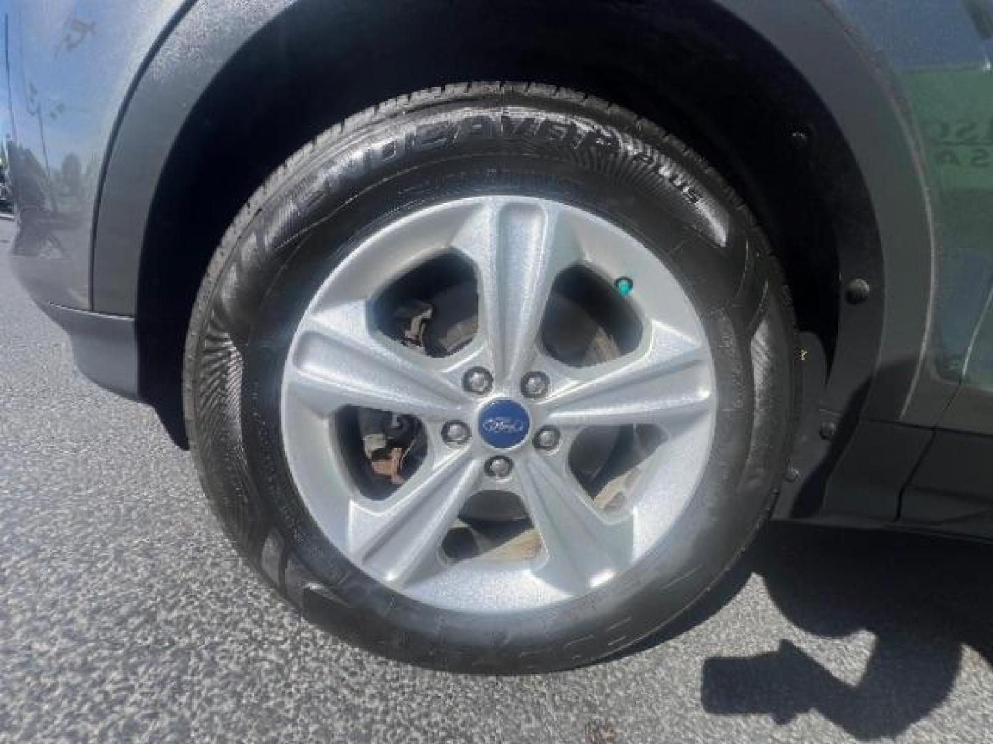 2014 Sterling Gray Metallic /Medium Light Stone Ford Escape SE (1FMCU9GX2EU) with an EcoBoost 1.6L I-4 gasoline direct injection engine, AUTOMATIC transmission, located at 940 North Main Street, Cedar City, UT, 84720, (435) 628-0023, 37.692936, -113.061897 - We specialize in helping ALL people get the best financing available. No matter your credit score, good, bad or none we can get you an amazing rate. Had a bankruptcy, divorce, or repossessions? We give you the green light to get your credit back on the road. Low down and affordable payments that fit- Photo#10