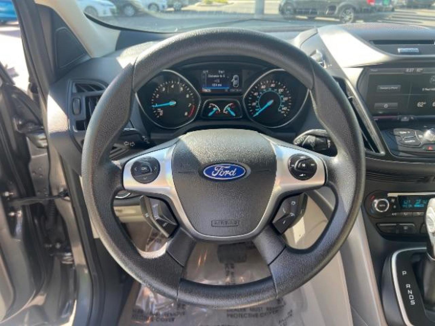 2014 Sterling Gray Metallic /Medium Light Stone Ford Escape SE (1FMCU9GX2EU) with an EcoBoost 1.6L I-4 gasoline direct injection engine, AUTOMATIC transmission, located at 940 North Main Street, Cedar City, UT, 84720, (435) 628-0023, 37.692936, -113.061897 - We specialize in helping ALL people get the best financing available. No matter your credit score, good, bad or none we can get you an amazing rate. Had a bankruptcy, divorce, or repossessions? We give you the green light to get your credit back on the road. Low down and affordable payments that fit- Photo#15