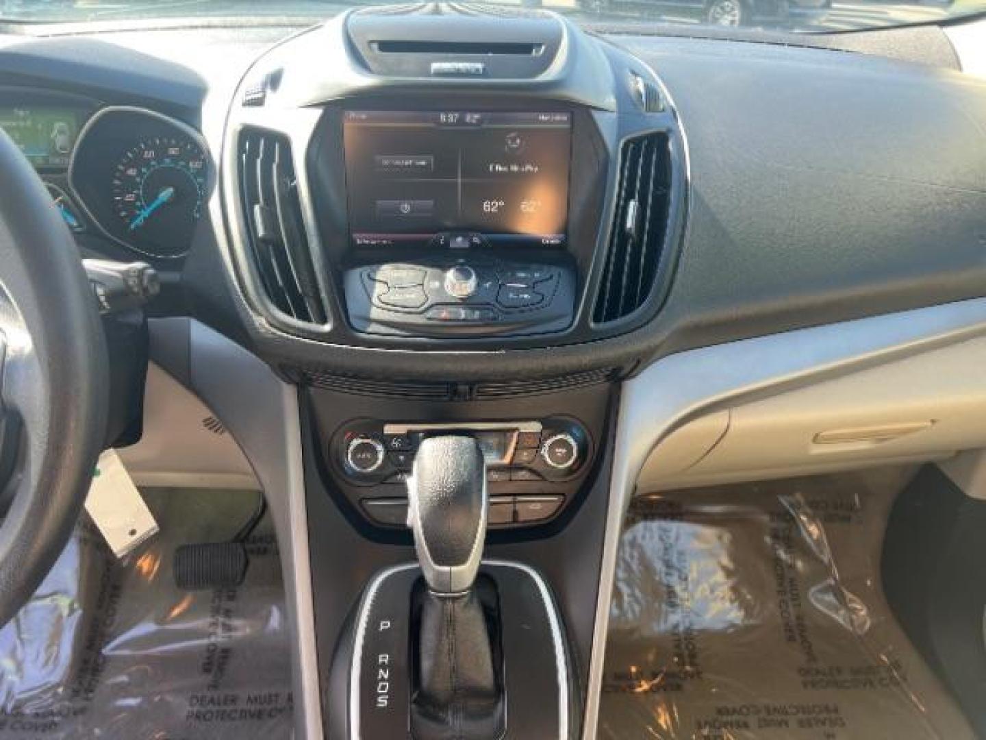 2014 Sterling Gray Metallic /Medium Light Stone Ford Escape SE (1FMCU9GX2EU) with an EcoBoost 1.6L I-4 gasoline direct injection engine, AUTOMATIC transmission, located at 940 North Main Street, Cedar City, UT, 84720, (435) 628-0023, 37.692936, -113.061897 - We specialize in helping ALL people get the best financing available. No matter your credit score, good, bad or none we can get you an amazing rate. Had a bankruptcy, divorce, or repossessions? We give you the green light to get your credit back on the road. Low down and affordable payments that fit- Photo#17