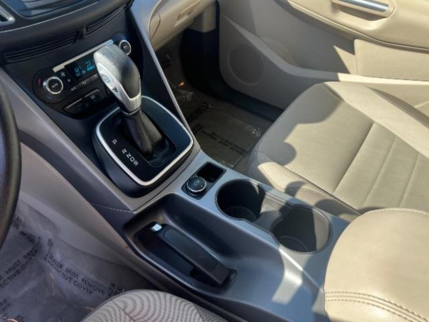 2014 Sterling Gray Metallic /Medium Light Stone Ford Escape SE (1FMCU9GX2EU) with an EcoBoost 1.6L I-4 gasoline direct injection engine, AUTOMATIC transmission, located at 940 North Main Street, Cedar City, UT, 84720, (435) 628-0023, 37.692936, -113.061897 - We specialize in helping ALL people get the best financing available. No matter your credit score, good, bad or none we can get you an amazing rate. Had a bankruptcy, divorce, or repossessions? We give you the green light to get your credit back on the road. Low down and affordable payments that fit- Photo#18