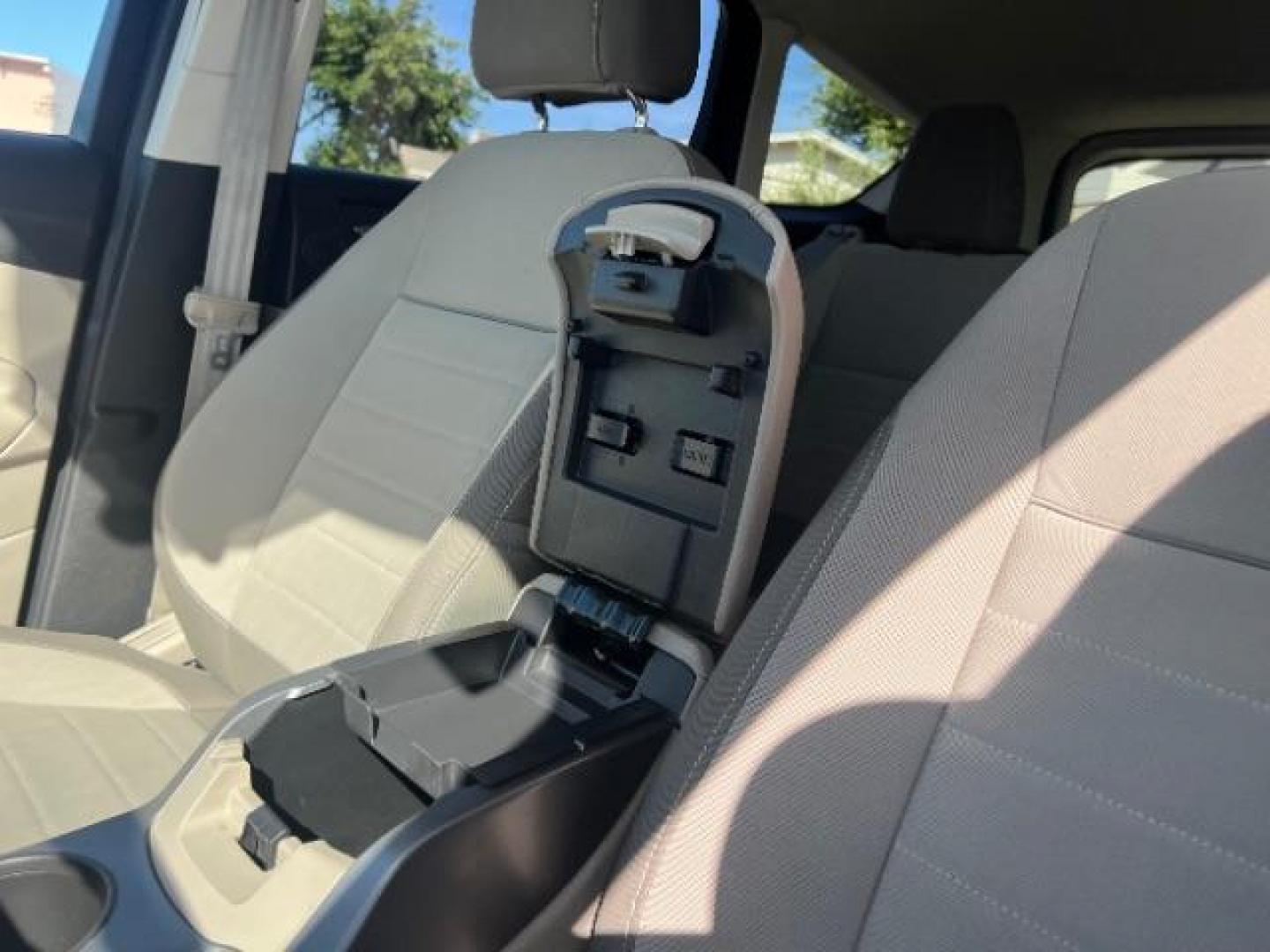 2014 Sterling Gray Metallic /Medium Light Stone Ford Escape SE (1FMCU9GX2EU) with an EcoBoost 1.6L I-4 gasoline direct injection engine, AUTOMATIC transmission, located at 940 North Main Street, Cedar City, UT, 84720, (435) 628-0023, 37.692936, -113.061897 - We specialize in helping ALL people get the best financing available. No matter your credit score, good, bad or none we can get you an amazing rate. Had a bankruptcy, divorce, or repossessions? We give you the green light to get your credit back on the road. Low down and affordable payments that fit- Photo#19