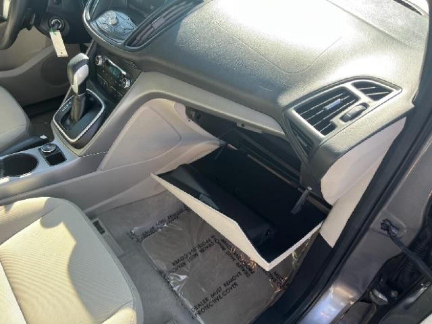 2014 Sterling Gray Metallic /Medium Light Stone Ford Escape SE (1FMCU9GX2EU) with an EcoBoost 1.6L I-4 gasoline direct injection engine, AUTOMATIC transmission, located at 940 North Main Street, Cedar City, UT, 84720, (435) 628-0023, 37.692936, -113.061897 - We specialize in helping ALL people get the best financing available. No matter your credit score, good, bad or none we can get you an amazing rate. Had a bankruptcy, divorce, or repossessions? We give you the green light to get your credit back on the road. Low down and affordable payments that fit- Photo#29