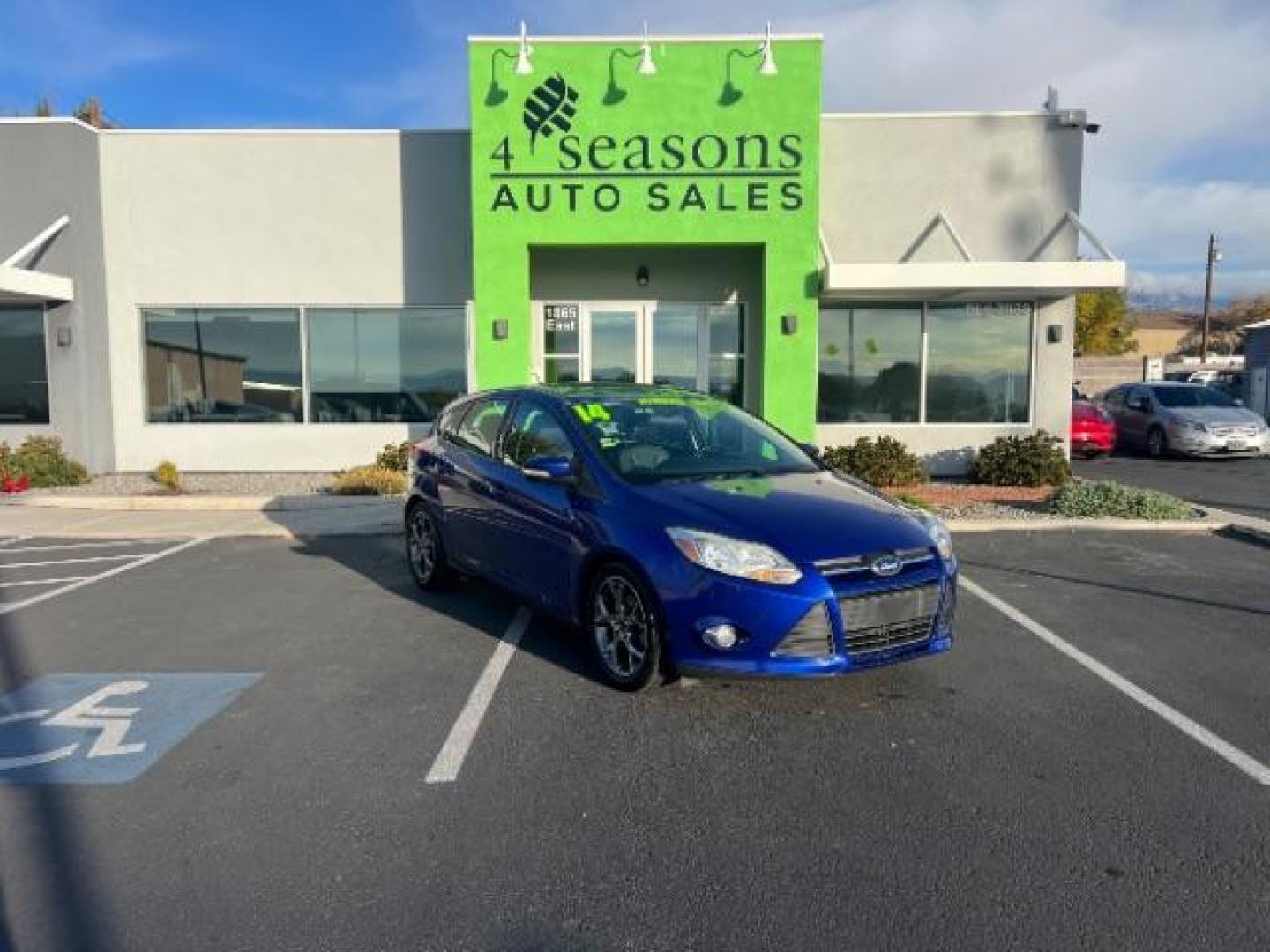 2014 Performance Blue Metallic /Medium Light Stone Ford Focus SE (1FADP3K20EL) with an 2L I-4 gasoline direct injection engine, Automatic transmission, located at 1865 East Red Hills Pkwy, St. George, 84770, (435) 628-0023, 37.120850, -113.543640 - We specialize in helping ALL people get the best financing available. No matter your credit score, good, bad or none we can get you an amazing rate. Had a bankruptcy, divorce, or repossessions? We give you the green light to get your credit back on the road. Low down and affordable payments that fit - Photo#0