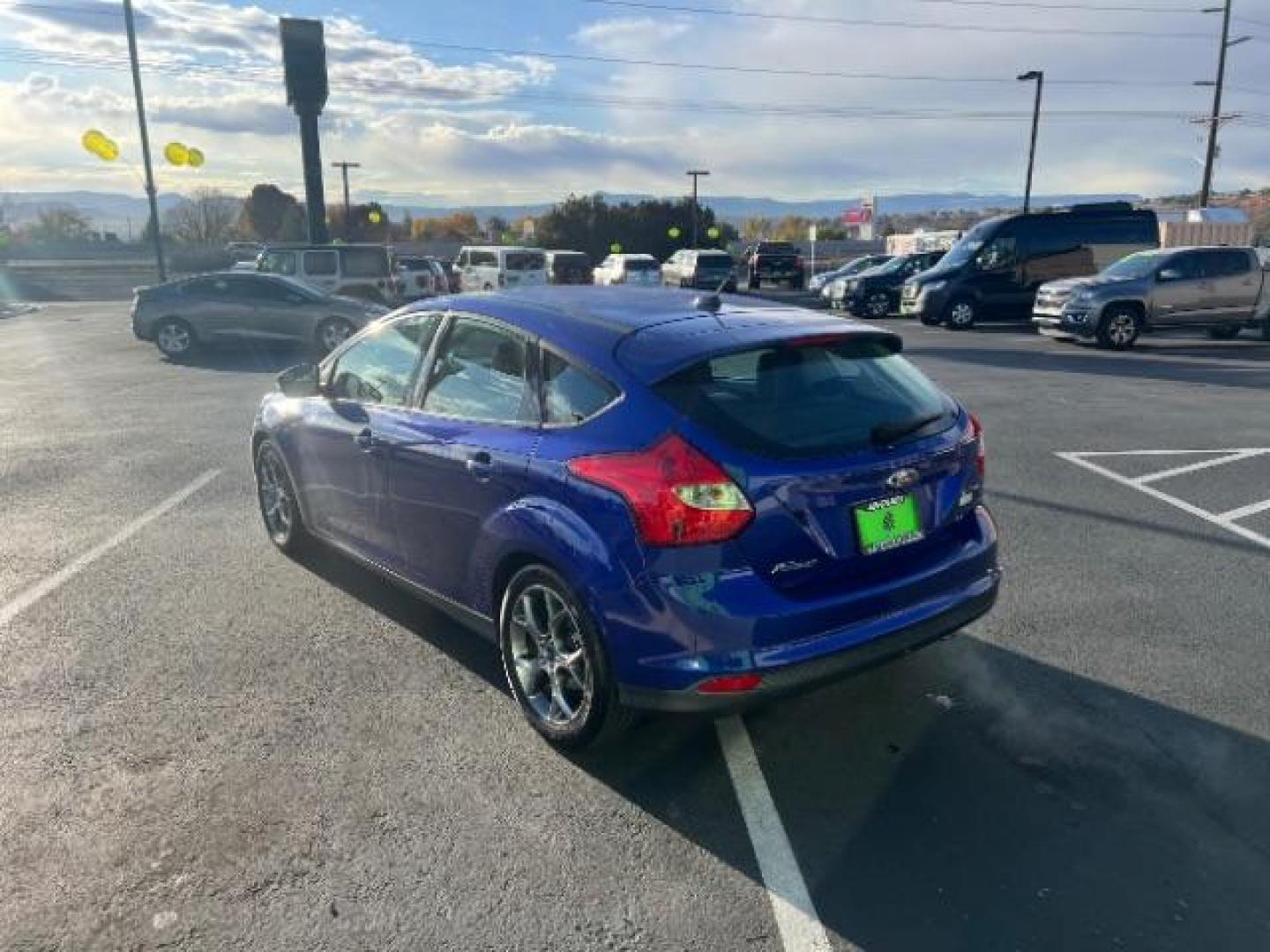 2014 Performance Blue Metallic /Medium Light Stone Ford Focus SE (1FADP3K20EL) with an 2L I-4 gasoline direct injection engine, Automatic transmission, located at 1865 East Red Hills Pkwy, St. George, 84770, (435) 628-0023, 37.120850, -113.543640 - We specialize in helping ALL people get the best financing available. No matter your credit score, good, bad or none we can get you an amazing rate. Had a bankruptcy, divorce, or repossessions? We give you the green light to get your credit back on the road. Low down and affordable payments that fit - Photo#4