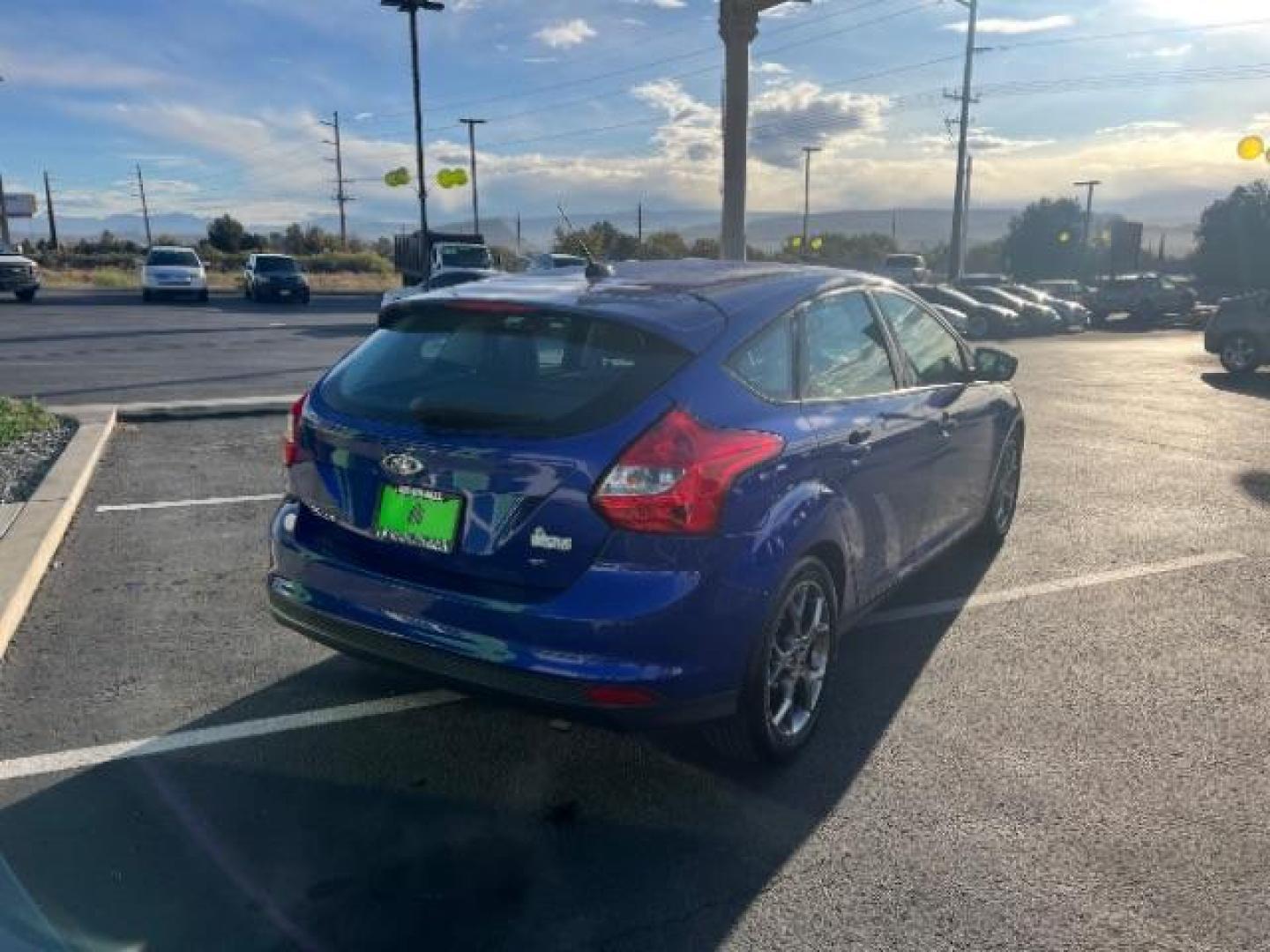 2014 Performance Blue Metallic /Medium Light Stone Ford Focus SE (1FADP3K20EL) with an 2L I-4 gasoline direct injection engine, Automatic transmission, located at 1865 East Red Hills Pkwy, St. George, 84770, (435) 628-0023, 37.120850, -113.543640 - We specialize in helping ALL people get the best financing available. No matter your credit score, good, bad or none we can get you an amazing rate. Had a bankruptcy, divorce, or repossessions? We give you the green light to get your credit back on the road. Low down and affordable payments that fit - Photo#6