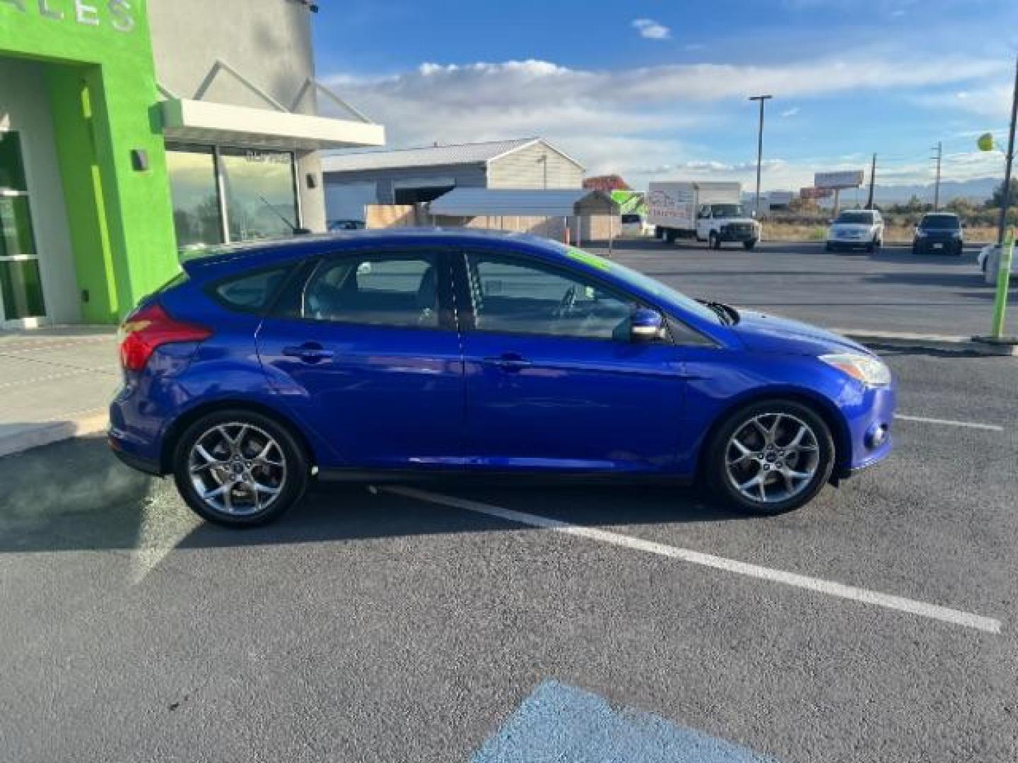 2014 Performance Blue Metallic /Medium Light Stone Ford Focus SE (1FADP3K20EL) with an 2L I-4 gasoline direct injection engine, Automatic transmission, located at 1865 East Red Hills Pkwy, St. George, 84770, (435) 628-0023, 37.120850, -113.543640 - We specialize in helping ALL people get the best financing available. No matter your credit score, good, bad or none we can get you an amazing rate. Had a bankruptcy, divorce, or repossessions? We give you the green light to get your credit back on the road. Low down and affordable payments that fit - Photo#7