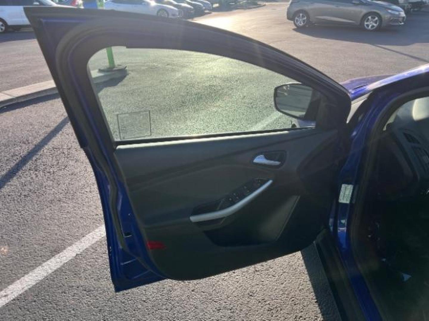 2014 Performance Blue Metallic /Medium Light Stone Ford Focus SE (1FADP3K20EL) with an 2L I-4 gasoline direct injection engine, Automatic transmission, located at 1865 East Red Hills Pkwy, St. George, 84770, (435) 628-0023, 37.120850, -113.543640 - We specialize in helping ALL people get the best financing available. No matter your credit score, good, bad or none we can get you an amazing rate. Had a bankruptcy, divorce, or repossessions? We give you the green light to get your credit back on the road. Low down and affordable payments that fit - Photo#12