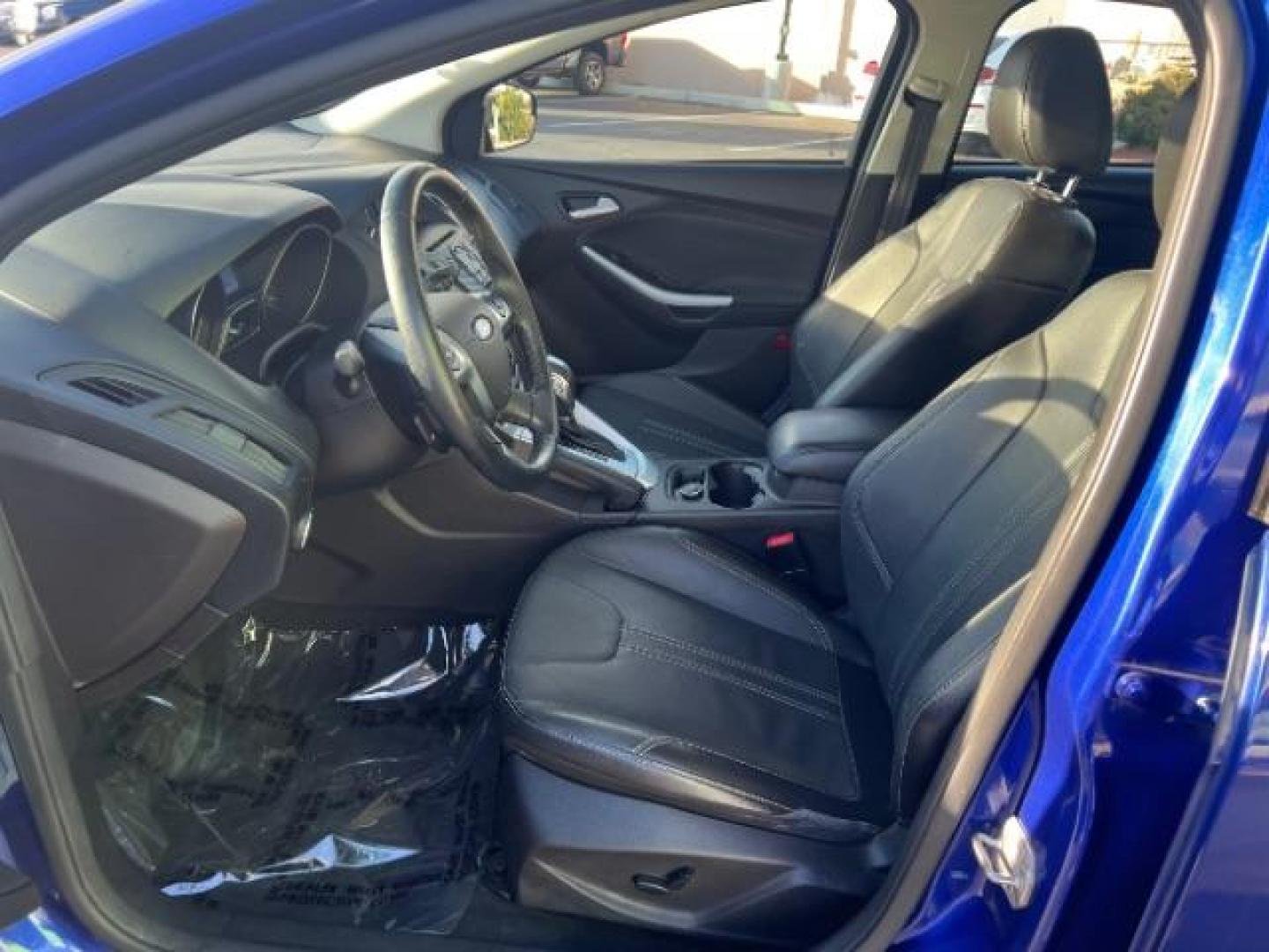 2014 Performance Blue Metallic /Medium Light Stone Ford Focus SE (1FADP3K20EL) with an 2L I-4 gasoline direct injection engine, Automatic transmission, located at 1865 East Red Hills Pkwy, St. George, 84770, (435) 628-0023, 37.120850, -113.543640 - We specialize in helping ALL people get the best financing available. No matter your credit score, good, bad or none we can get you an amazing rate. Had a bankruptcy, divorce, or repossessions? We give you the green light to get your credit back on the road. Low down and affordable payments that fit - Photo#14