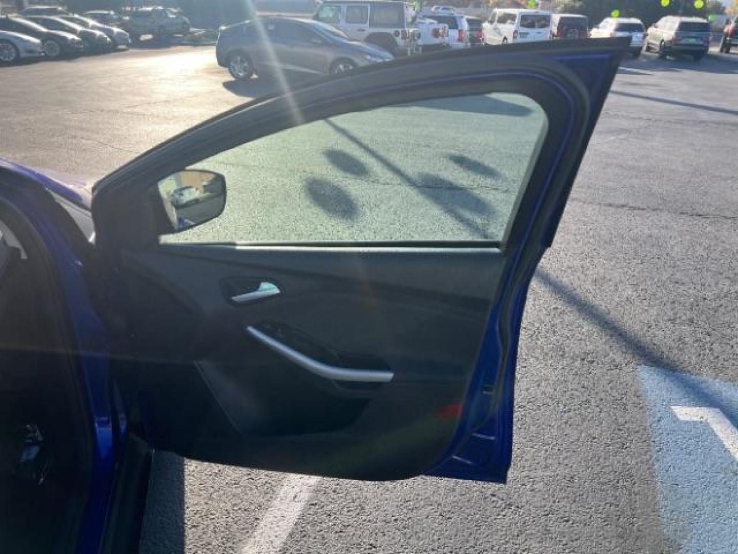 2014 Performance Blue Metallic /Medium Light Stone Ford Focus SE (1FADP3K20EL) with an 2L I-4 gasoline direct injection engine, Automatic transmission, located at 1865 East Red Hills Pkwy, St. George, 84770, (435) 628-0023, 37.120850, -113.543640 - We specialize in helping ALL people get the best financing available. No matter your credit score, good, bad or none we can get you an amazing rate. Had a bankruptcy, divorce, or repossessions? We give you the green light to get your credit back on the road. Low down and affordable payments that fit - Photo#27