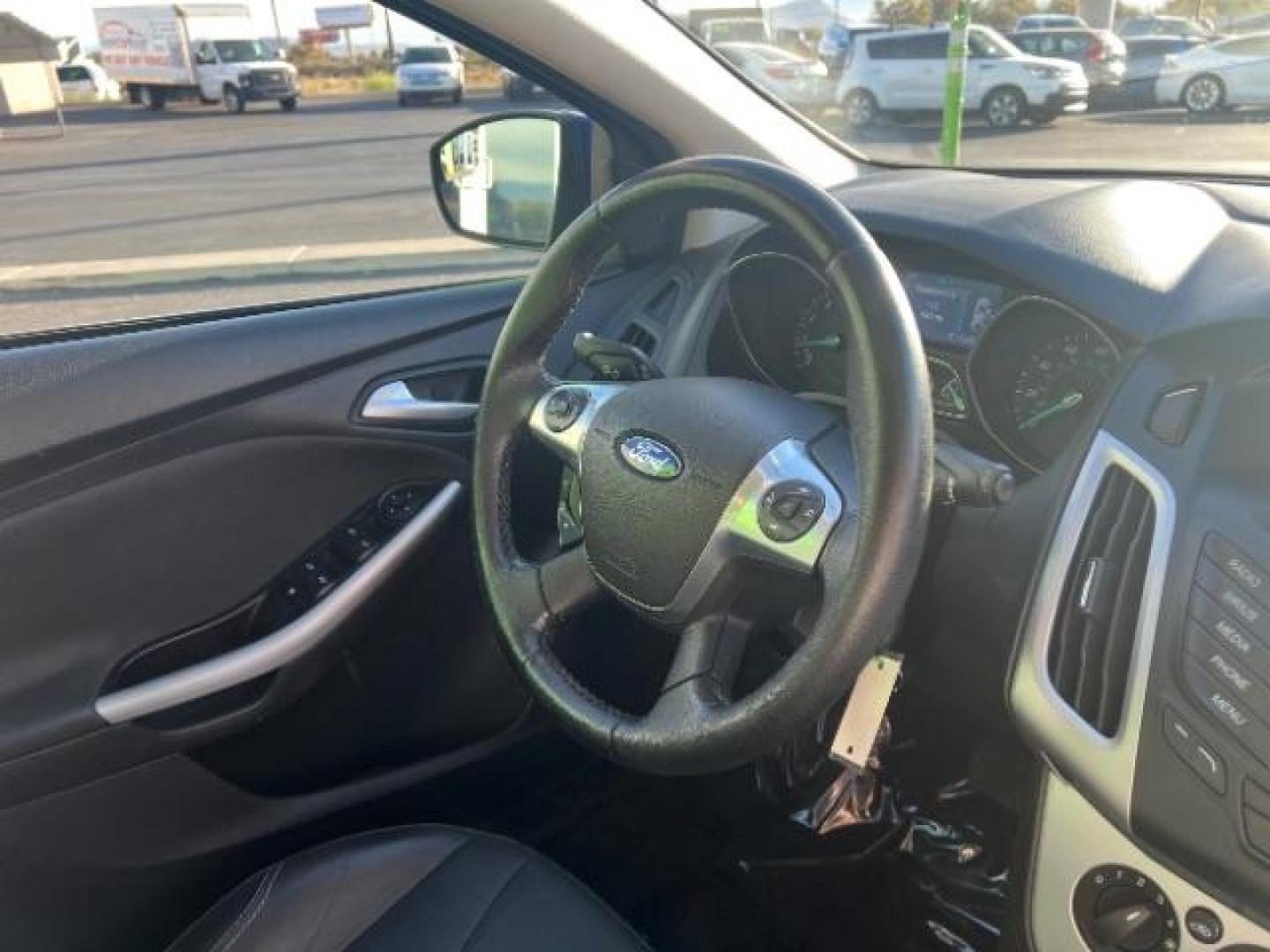 2014 Performance Blue Metallic /Medium Light Stone Ford Focus SE (1FADP3K20EL) with an 2L I-4 gasoline direct injection engine, Automatic transmission, located at 1865 East Red Hills Pkwy, St. George, 84770, (435) 628-0023, 37.120850, -113.543640 - We specialize in helping ALL people get the best financing available. No matter your credit score, good, bad or none we can get you an amazing rate. Had a bankruptcy, divorce, or repossessions? We give you the green light to get your credit back on the road. Low down and affordable payments that fit - Photo#30