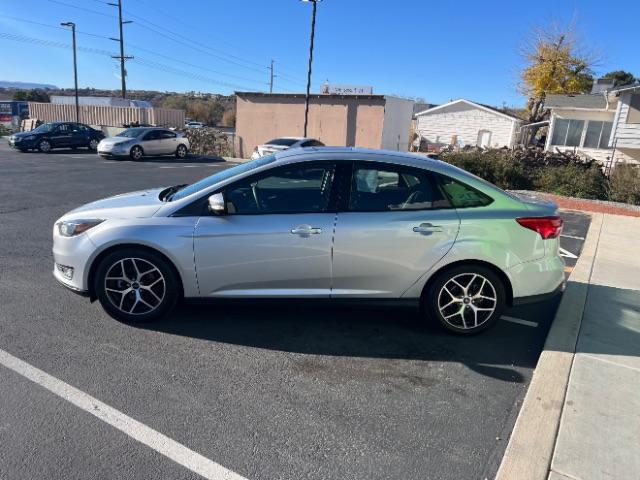 2017 Ingot Silver Metallic /Charcoal Black Ford Focus SEL (1FADP3H26HL) with an 2L I-4 gasoline direct injection engine, Automatic transmission, located at 1865 East Red Hills Pkwy, St. George, 84770, (435) 628-0023, 37.120850, -113.543640 - We specialize in helping ALL people get the best financing available. No matter your credit score, good, bad or none we can get you an amazing rate. Had a bankruptcy, divorce, or repossessions? We give you the green light to get your credit back on the road. Low down and affordable payments that fit - Photo#3