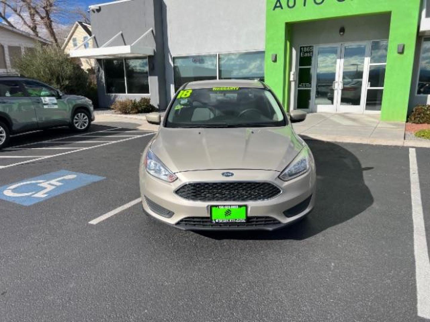 2018 White Gold Metallic /Medium Light Stone Ford Focus SE (1FADP3F23JL) with an EcoBoost 1L I-3 gasoline direct injection engine, Automatic transmission, located at 940 North Main Street, Cedar City, UT, 84720, (435) 628-0023, 37.692936, -113.061897 - Photo#1