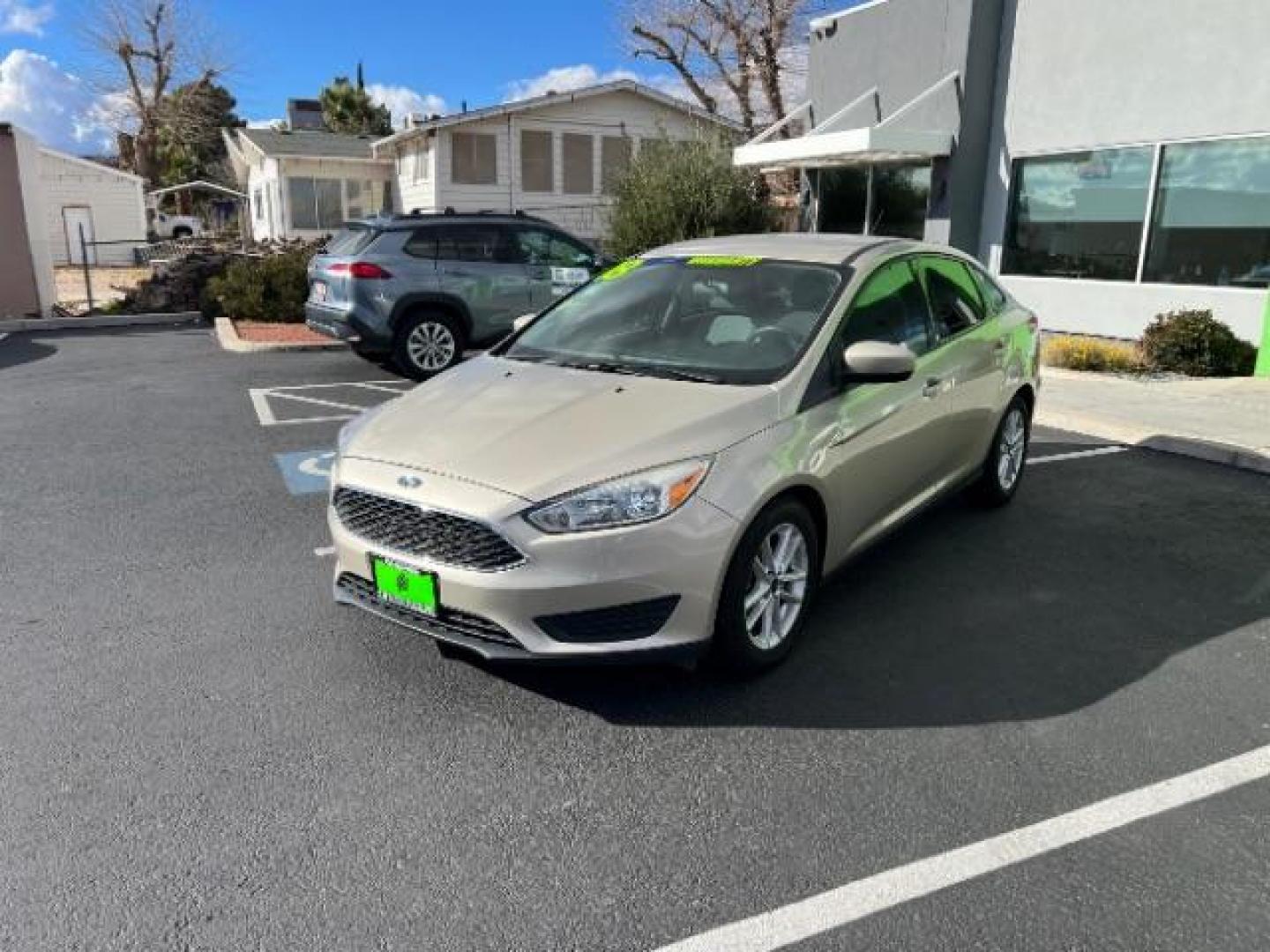 2018 White Gold Metallic /Medium Light Stone Ford Focus SE (1FADP3F23JL) with an EcoBoost 1L I-3 gasoline direct injection engine, Automatic transmission, located at 940 North Main Street, Cedar City, UT, 84720, (435) 628-0023, 37.692936, -113.061897 - Photo#2