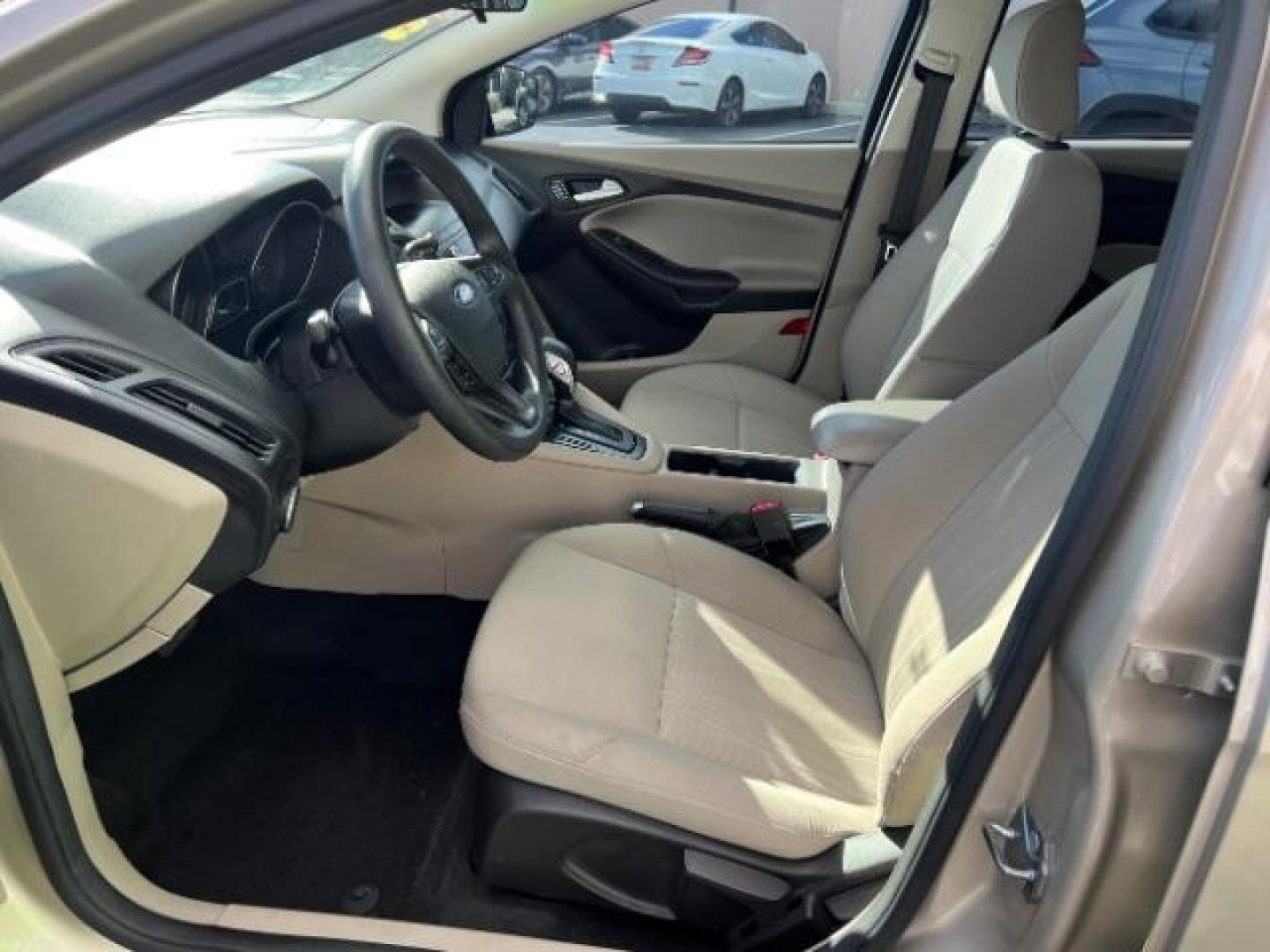 2018 White Gold Metallic /Medium Light Stone Ford Focus SE (1FADP3F23JL) with an EcoBoost 1L I-3 gasoline direct injection engine, Automatic transmission, located at 940 North Main Street, Cedar City, UT, 84720, (435) 628-0023, 37.692936, -113.061897 - Photo#14