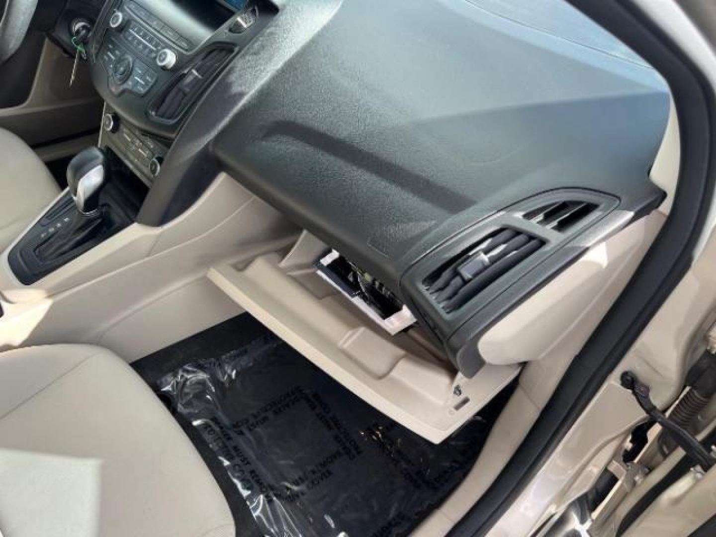 2018 White Gold Metallic /Medium Light Stone Ford Focus SE (1FADP3F23JL) with an EcoBoost 1L I-3 gasoline direct injection engine, Automatic transmission, located at 940 North Main Street, Cedar City, UT, 84720, (435) 628-0023, 37.692936, -113.061897 - Photo#28