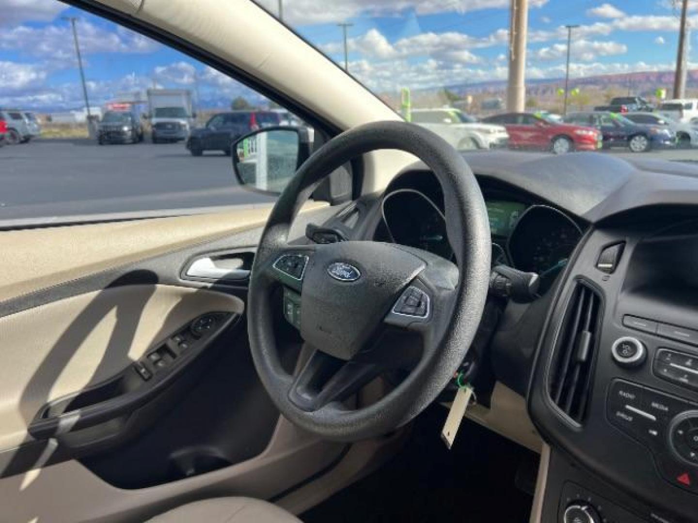 2018 White Gold Metallic /Medium Light Stone Ford Focus SE (1FADP3F23JL) with an EcoBoost 1L I-3 gasoline direct injection engine, Automatic transmission, located at 940 North Main Street, Cedar City, UT, 84720, (435) 628-0023, 37.692936, -113.061897 - Photo#29