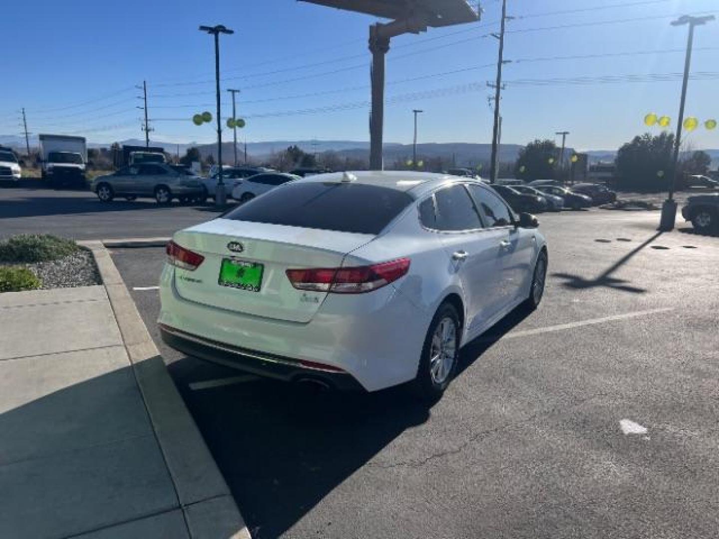 2017 Snow White Pearl /Black Kia Optima LX (5XXGT4L38HG) with an Theta II 2.4L I-4 gasoline direct injection engine, Automatic transmission, located at 1865 East Red Hills Pkwy, St. George, 84770, (435) 628-0023, 37.120850, -113.543640 - We specialize in helping ALL people get the best financing available. No matter your credit score, good, bad or none we can get you an amazing rate. Had a bankruptcy, divorce, or repossessions? We give you the green light to get your credit back on the road. Low down and affordable payments that fit - Photo#6