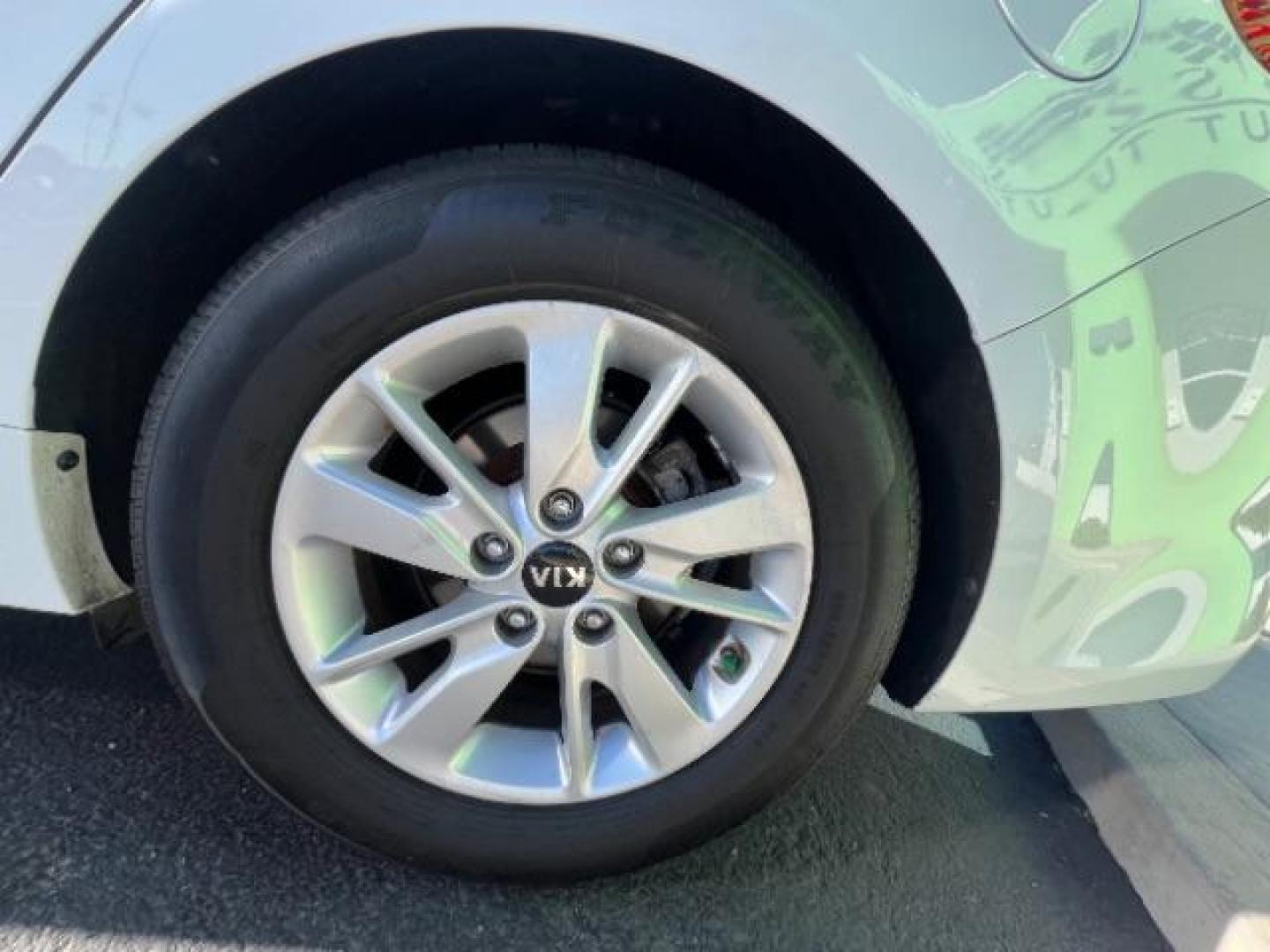 2017 Snow White Pearl /Black Kia Optima LX (5XXGT4L38HG) with an Theta II 2.4L I-4 gasoline direct injection engine, Automatic transmission, located at 1865 East Red Hills Pkwy, St. George, 84770, (435) 628-0023, 37.120850, -113.543640 - We specialize in helping ALL people get the best financing available. No matter your credit score, good, bad or none we can get you an amazing rate. Had a bankruptcy, divorce, or repossessions? We give you the green light to get your credit back on the road. Low down and affordable payments that fit - Photo#11