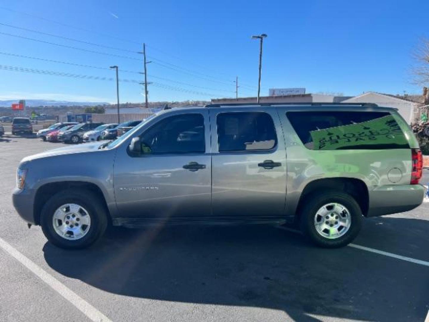 2009 Graystone Metallic /Ebony Cloth Interior Chevrolet Suburban LS 1500 4WD (1GNFK163X9R) with an 5.3L V8 OHV 16V FFV engine, 6-Speed Automatic transmission, located at 1865 East Red Hills Pkwy, St. George, 84770, (435) 628-0023, 37.120850, -113.543640 - We specialize in helping ALL people get the best financing available. No matter your credit score, good, bad or none we can get you an amazing rate. Had a bankruptcy, divorce, or repossessions? We give you the green light to get your credit back on the road. Low down and affordable payments that fit - Photo#3