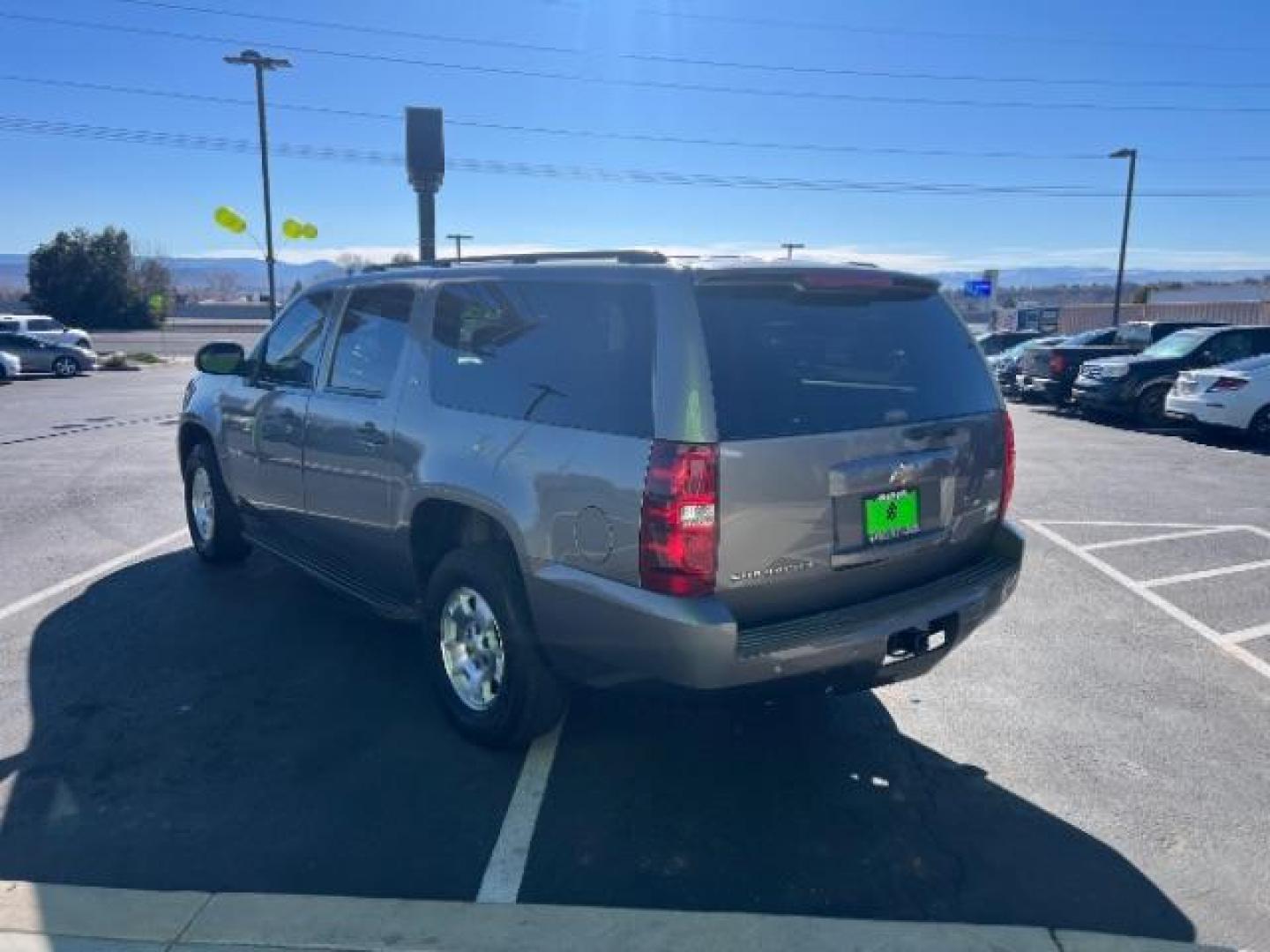 2009 Graystone Metallic /Ebony Cloth Interior Chevrolet Suburban LS 1500 4WD (1GNFK163X9R) with an 5.3L V8 OHV 16V FFV engine, 6-Speed Automatic transmission, located at 1865 East Red Hills Pkwy, St. George, 84770, (435) 628-0023, 37.120850, -113.543640 - We specialize in helping ALL people get the best financing available. No matter your credit score, good, bad or none we can get you an amazing rate. Had a bankruptcy, divorce, or repossessions? We give you the green light to get your credit back on the road. Low down and affordable payments that fit - Photo#4