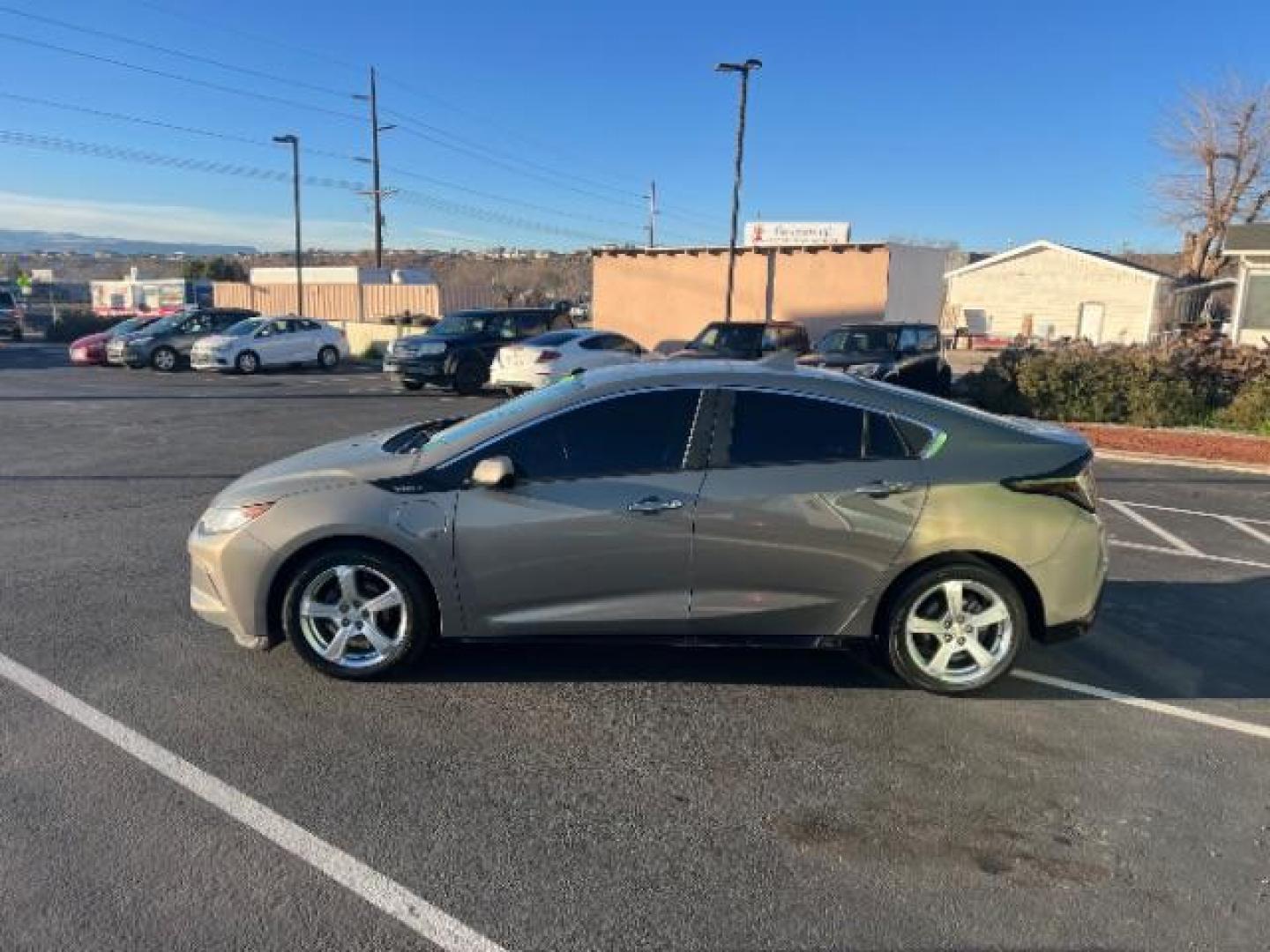 2017 Pepperdust Metallic /Jet Black/Jet Black Chevrolet Volt LT (1G1RC6S55HU) with an Voltec 1.5L I-4 gasoline direct injection engine, Automatic transmission, located at 940 North Main Street, Cedar City, UT, 84720, (435) 628-0023, 37.692936, -113.061897 - We specialize in helping ALL people get the best financing available. No matter your credit score, good, bad or none we can get you an amazing rate. Had a bankruptcy, divorce, or repossessions? We give you the green light to get your credit back on the road. Low down and affordable payments that fit - Photo#3