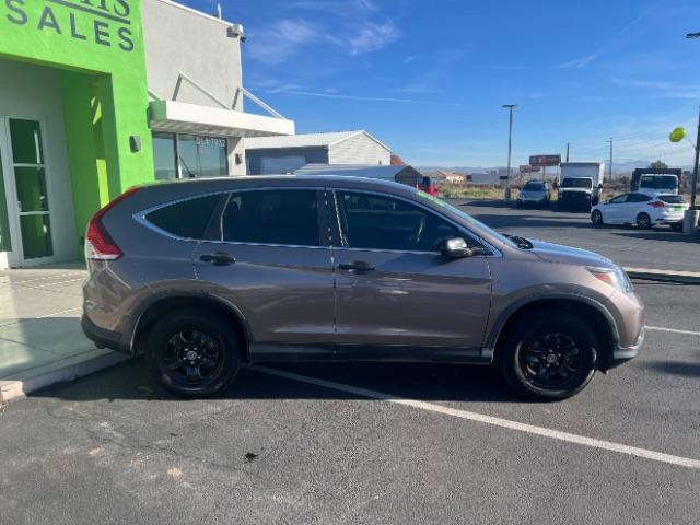 2013 Polished Metal Metallic /Black Honda CR-V LX (5J6RM4H39DL) with an 2.4L I-4 DOHC engine, Automatic transmission, located at 940 North Main Street, Cedar City, UT, 84720, (435) 628-0023, 37.692936, -113.061897 - We specialize in helping ALL people get the best financing available. No matter your credit score, good, bad or none we can get you an amazing rate. Had a bankruptcy, divorce, or repossessions? We give you the green light to get your credit back on the road. Low down and affordable payments that fit - Photo#7