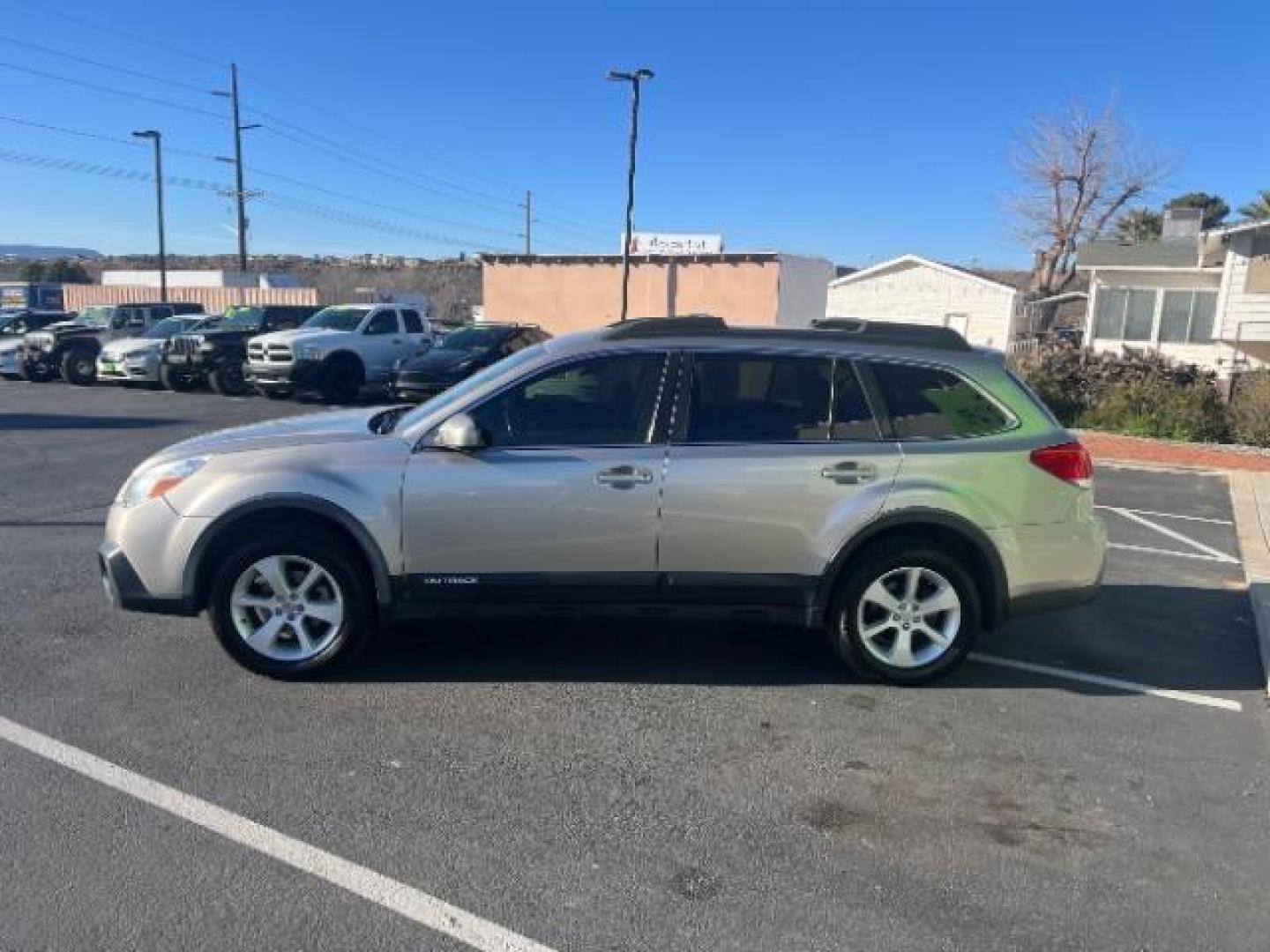 2014 Ice Silver Metallic /Ivory Subaru Outback 2.5i Premium (4S4BRCCC3E3) with an 2.5L H-4 DOHC engine, Automatic transmission, located at 940 North Main Street, Cedar City, UT, 84720, (435) 628-0023, 37.692936, -113.061897 - We specialize in helping ALL people get the best financing available. No matter your credit score, good, bad or none we can get you an amazing rate. Had a bankruptcy, divorce, or repossessions? We give you the green light to get your credit back on the road. Low down and affordable payments that fit - Photo#3
