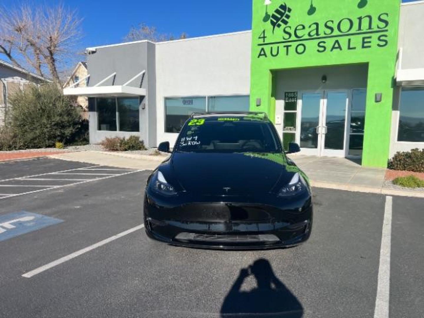 2023 Solid Black /Black Tesla Model Y Long Range Dual Motor All-Wheel Drive | AWD (7SAYGAEE8PF) with an ELECTRIC engine, Electric transmission, located at 1865 East Red Hills Pkwy, St. George, 84770, (435) 628-0023, 37.120850, -113.543640 - Blacked out Long Range AWD model Y with Hardware 4 AND 3rd row. Truly rare and hard to find. Hardware 4 is needed for latest FSD. Also has power roof shade, roof rack, trim, blacked out tail lights, new tires. Excellent condition. Battery charges to 300, Runs a drives perfect. Factory warranty on - Photo#3