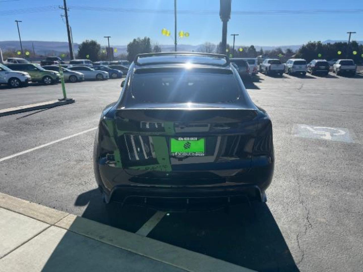 2023 Solid Black /Black Tesla Model Y Long Range Dual Motor All-Wheel Drive | AWD (7SAYGAEE8PF) with an ELECTRIC engine, Electric transmission, located at 1865 East Red Hills Pkwy, St. George, 84770, (435) 628-0023, 37.120850, -113.543640 - Blacked out Long Range AWD model Y with Hardware 4 AND 3rd row. Truly rare and hard to find. Hardware 4 is needed for latest FSD. Also has power roof shade, roof rack, trim, blacked out tail lights, new tires. Excellent condition. Battery charges to 300, Runs a drives perfect. Factory warranty on - Photo#7