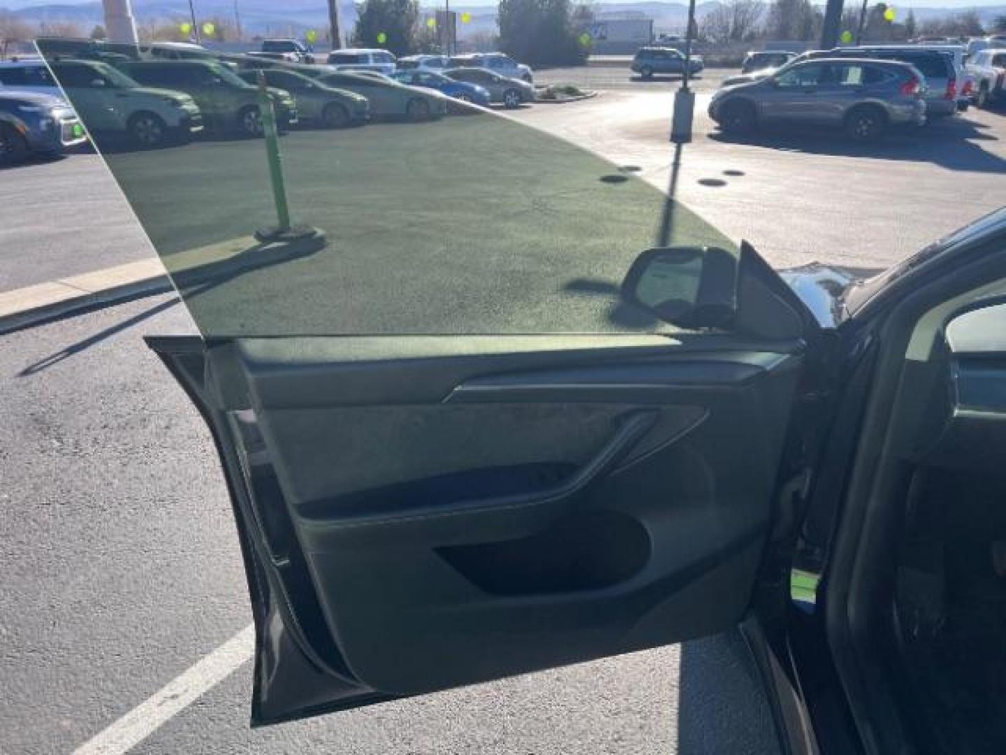 2023 Solid Black /Black Tesla Model Y Long Range Dual Motor All-Wheel Drive | AWD (7SAYGAEE8PF) with an ELECTRIC engine, Electric transmission, located at 1865 East Red Hills Pkwy, St. George, 84770, (435) 628-0023, 37.120850, -113.543640 - Blacked out Long Range AWD model Y with Hardware 4 AND 3rd row. Truly rare and hard to find. Hardware 4 is needed for latest FSD. Also has power roof shade, roof rack, trim, blacked out tail lights, new tires. Excellent condition. Battery charges to 300, Runs a drives perfect. Factory warranty on - Photo#14