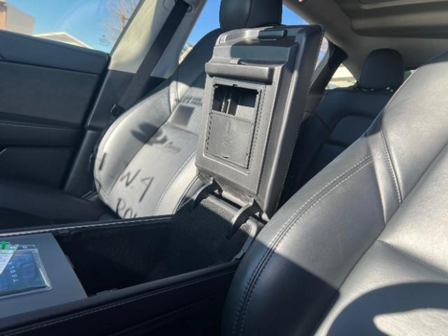 2023 Solid Black /Black Tesla Model Y Long Range Dual Motor All-Wheel Drive | AWD (7SAYGAEE8PF) with an ELECTRIC engine, Electric transmission, located at 1865 East Red Hills Pkwy, St. George, 84770, (435) 628-0023, 37.120850, -113.543640 - Blacked out Long Range AWD model Y with Hardware 4 AND 3rd row. Truly rare and hard to find. Hardware 4 is needed for latest FSD. Also has power roof shade, roof rack, trim, blacked out tail lights, new tires. Excellent condition. Battery charges to 300, Runs a drives perfect. Factory warranty on - Photo#19