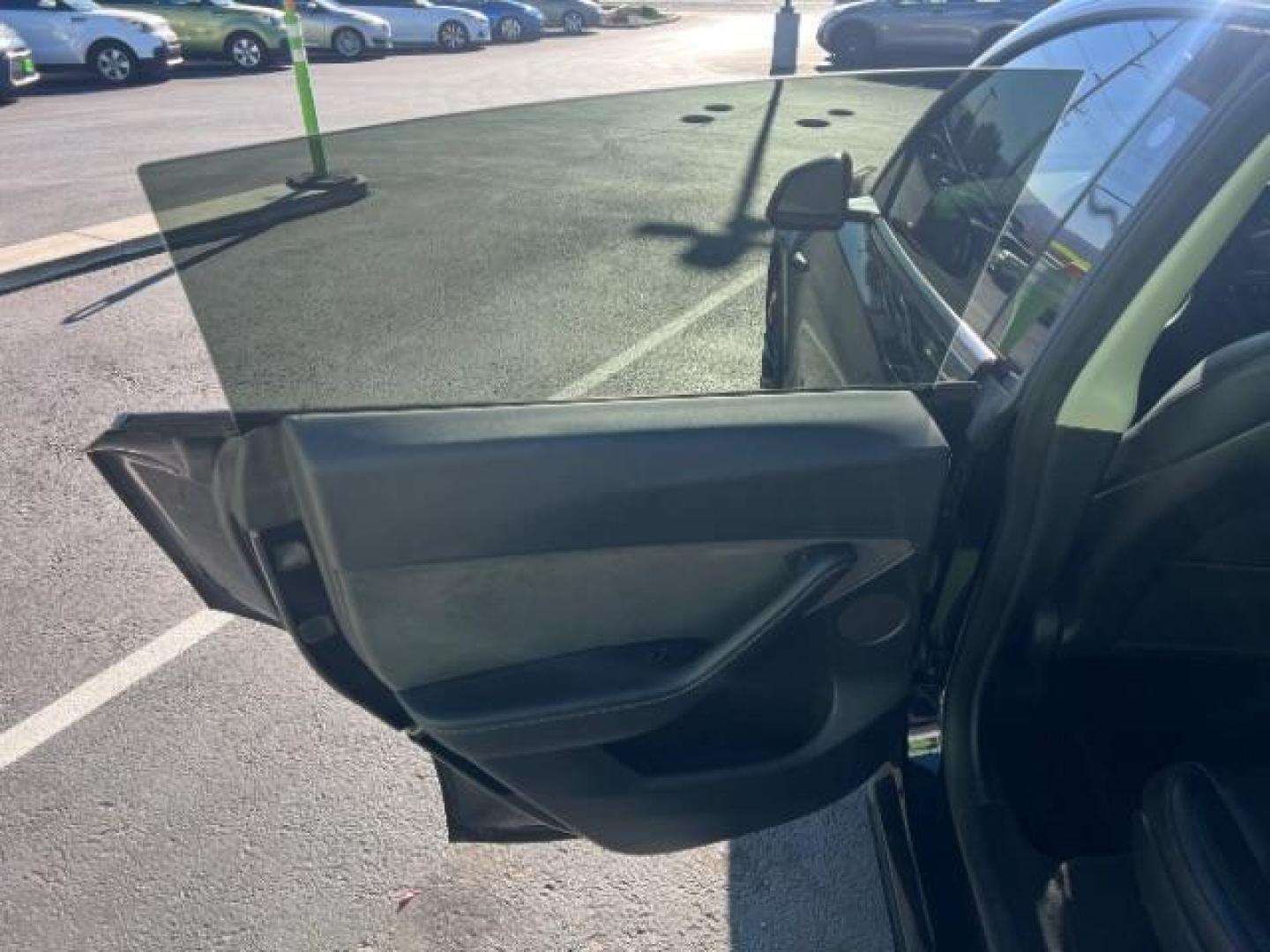 2023 Solid Black /Black Tesla Model Y Long Range Dual Motor All-Wheel Drive | AWD (7SAYGAEE8PF) with an ELECTRIC engine, Electric transmission, located at 1865 East Red Hills Pkwy, St. George, 84770, (435) 628-0023, 37.120850, -113.543640 - Blacked out Long Range AWD model Y with Hardware 4 AND 3rd row. Truly rare and hard to find. Hardware 4 is needed for latest FSD. Also has power roof shade, roof rack, trim, blacked out tail lights, new tires. Excellent condition. Battery charges to 300, Runs a drives perfect. Factory warranty on - Photo#20