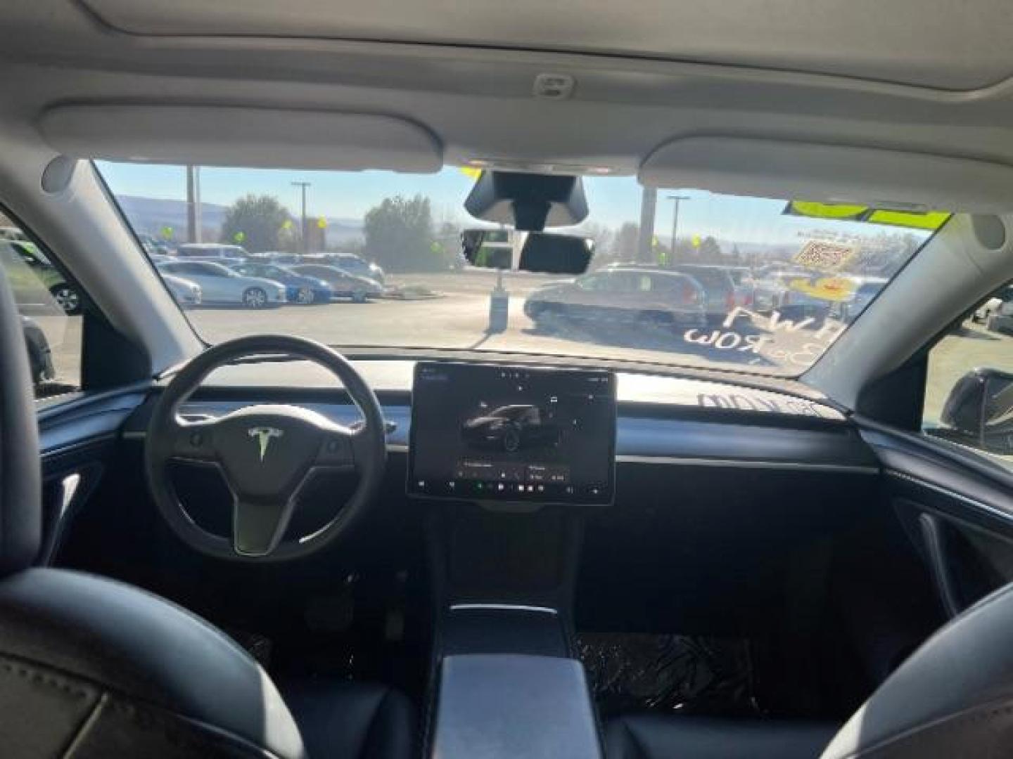 2023 Solid Black /Black Tesla Model Y Long Range Dual Motor All-Wheel Drive | AWD (7SAYGAEE8PF) with an ELECTRIC engine, Electric transmission, located at 1865 East Red Hills Pkwy, St. George, 84770, (435) 628-0023, 37.120850, -113.543640 - Blacked out Long Range AWD model Y with Hardware 4 AND 3rd row. Truly rare and hard to find. Hardware 4 is needed for latest FSD. Also has power roof shade, roof rack, trim, blacked out tail lights, new tires. Excellent condition. Battery charges to 300, Runs a drives perfect. Factory warranty on - Photo#23