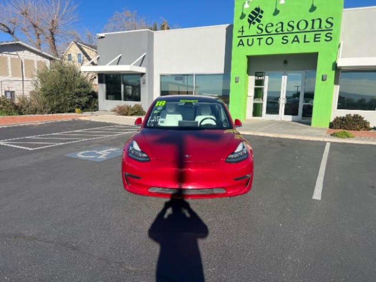 2018 Red Multi-Coat /White Tesla Model 3 Long Range (5YJ3E1EBXJF) with an ELECTRIC engine, Automatic transmission, located at 1865 East Red Hills Pkwy, St. George, 84770, (435) 628-0023, 37.120850, -113.543640 - Beautiful red on white model 3 Long range with Full Self Driving software PAID FOR! ($8k value) and Acceleration boost PAID FOR ($2k value). Every Tesla we sell comes with a charger. Not even Tesla does that! Great condition, Excellent battery health 280 on full charge. Full Tesla motor and batte - Photo#3