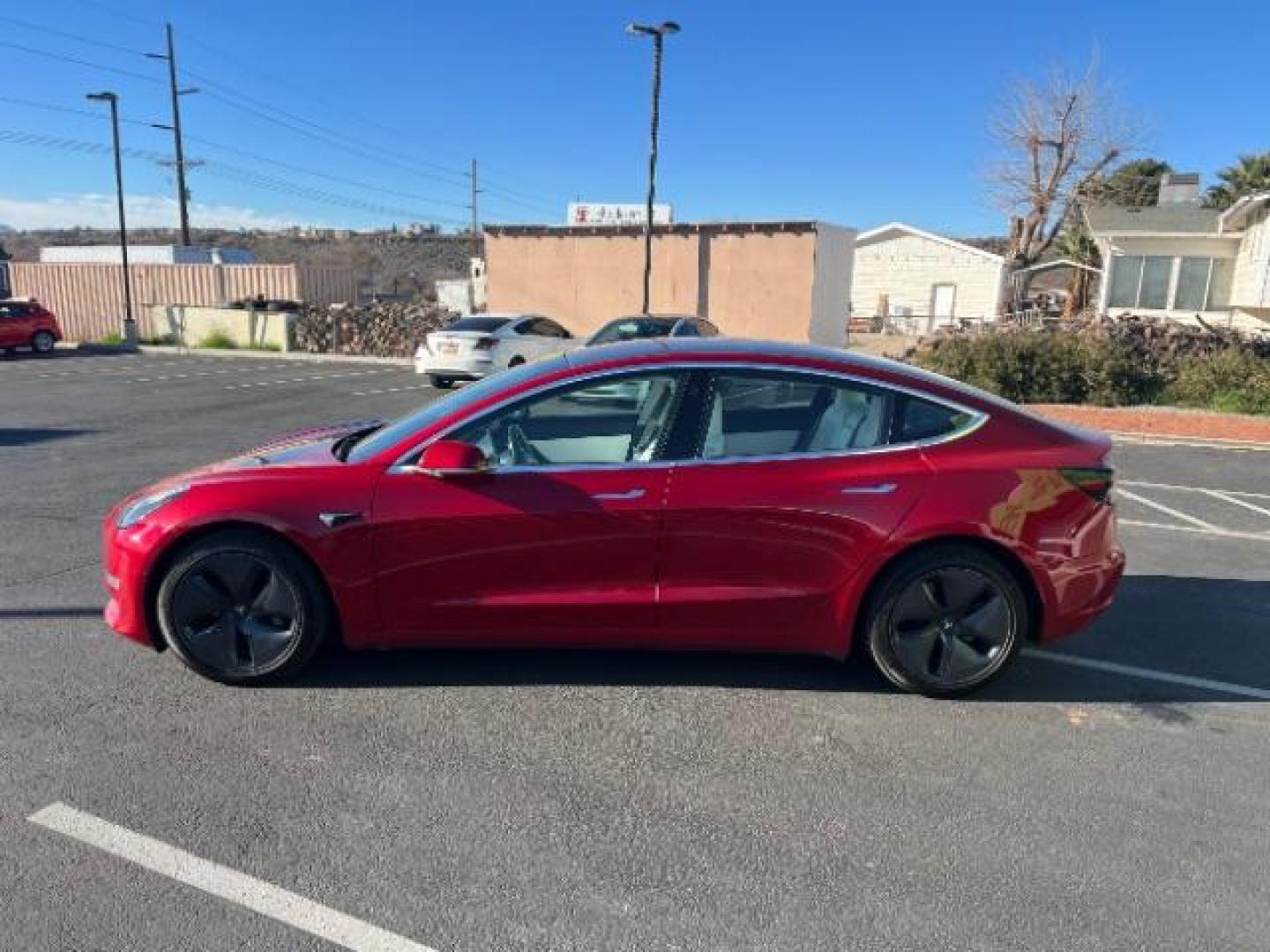 2018 Red Multi-Coat /White Tesla Model 3 Long Range (5YJ3E1EBXJF) with an ELECTRIC engine, Automatic transmission, located at 1865 East Red Hills Pkwy, St. George, 84770, (435) 628-0023, 37.120850, -113.543640 - Beautiful red on white model 3 Long range with Full Self Driving software PAID FOR! ($8k value) and Acceleration boost PAID FOR ($2k value). Every Tesla we sell comes with a charger. Not even Tesla does that! Great condition, Excellent battery health 280 on full charge. Full Tesla motor and batte - Photo#5