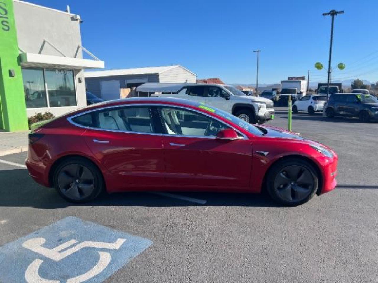 2018 Red Multi-Coat /White Tesla Model 3 Long Range (5YJ3E1EBXJF) with an ELECTRIC engine, Automatic transmission, located at 1865 East Red Hills Pkwy, St. George, 84770, (435) 628-0023, 37.120850, -113.543640 - Beautiful red on white model 3 Long range with Full Self Driving software PAID FOR! ($8k value) and Acceleration boost PAID FOR ($2k value). Every Tesla we sell comes with a charger. Not even Tesla does that! Great condition, Excellent battery health 280 on full charge. Full Tesla motor and batte - Photo#9