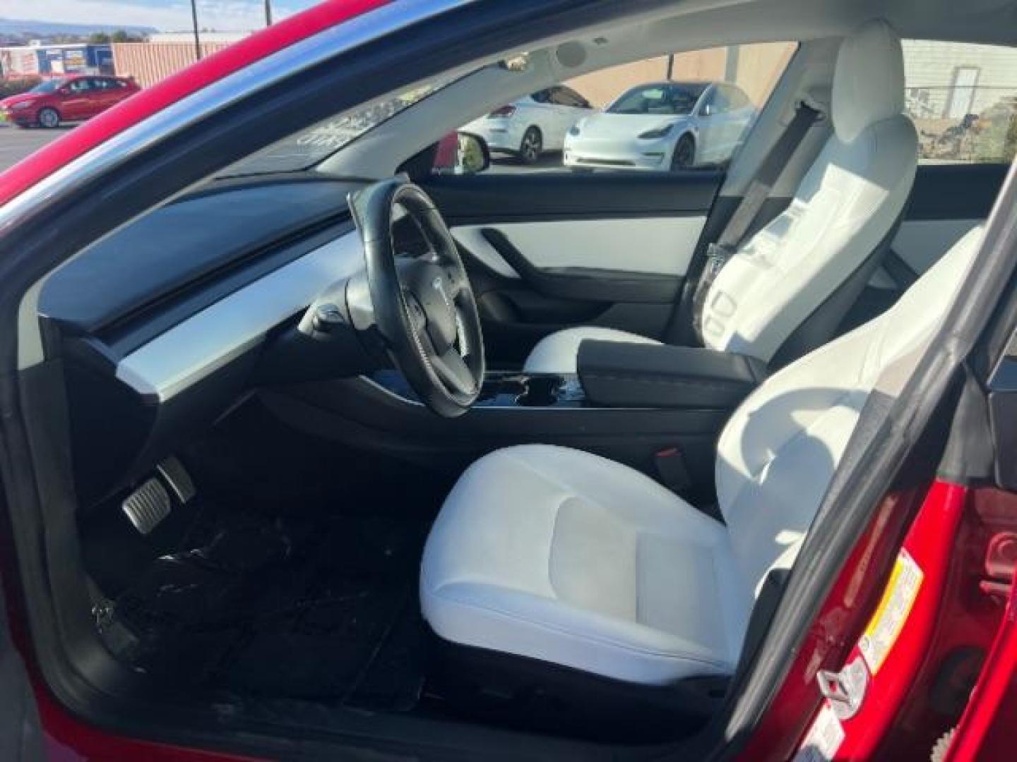 2018 Red Multi-Coat /White Tesla Model 3 Long Range (5YJ3E1EBXJF) with an ELECTRIC engine, Automatic transmission, located at 1865 East Red Hills Pkwy, St. George, 84770, (435) 628-0023, 37.120850, -113.543640 - Beautiful red on white model 3 Long range with Full Self Driving software PAID FOR! ($8k value) and Acceleration boost PAID FOR ($2k value). Every Tesla we sell comes with a charger. Not even Tesla does that! Great condition, Excellent battery health 280 on full charge. Full Tesla motor and batte - Photo#16