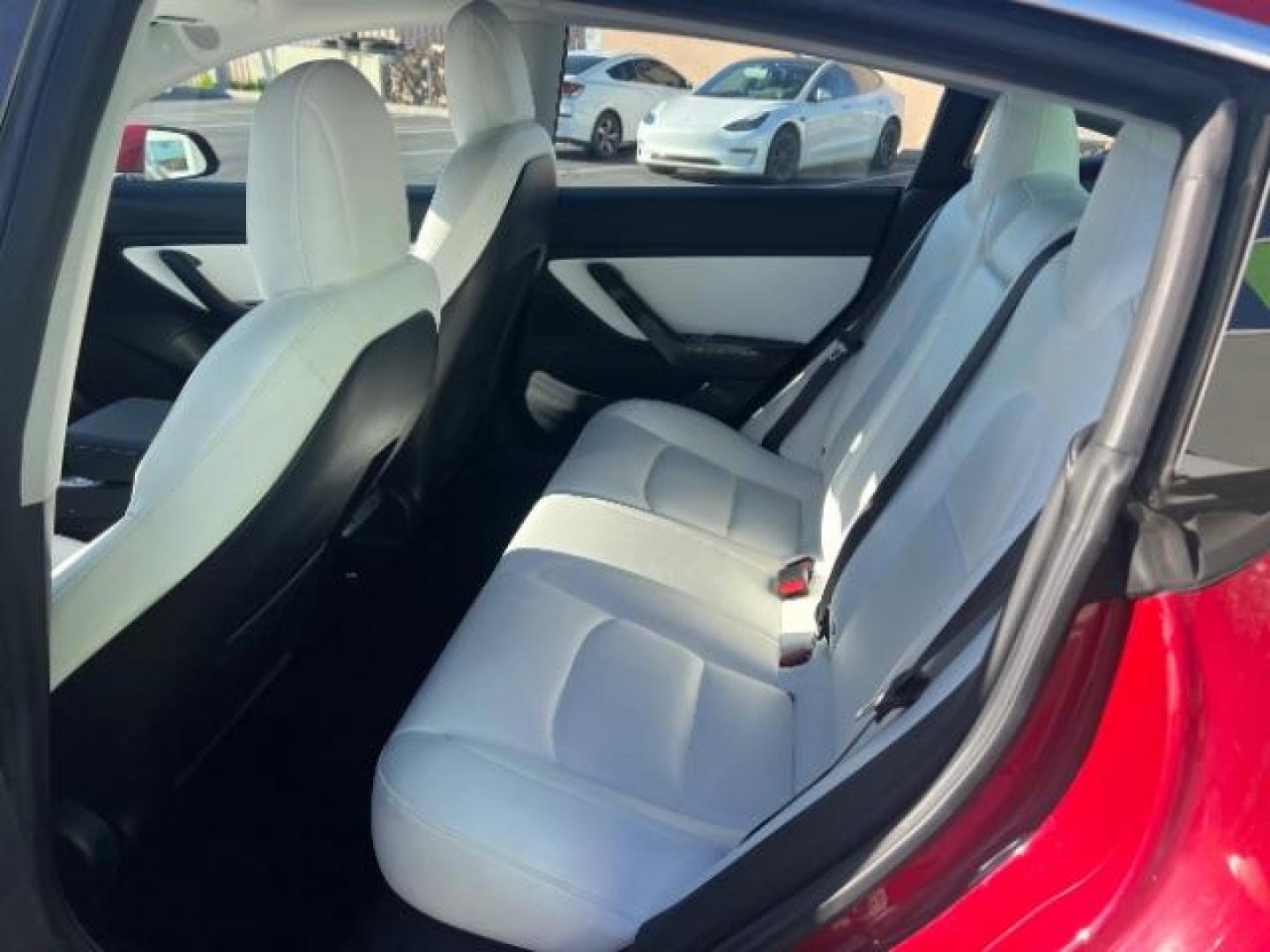 2018 Red Multi-Coat /White Tesla Model 3 Long Range (5YJ3E1EBXJF) with an ELECTRIC engine, Automatic transmission, located at 1865 East Red Hills Pkwy, St. George, 84770, (435) 628-0023, 37.120850, -113.543640 - Beautiful red on white model 3 Long range with Full Self Driving software PAID FOR! ($8k value) and Acceleration boost PAID FOR ($2k value). Every Tesla we sell comes with a charger. Not even Tesla does that! Great condition, Excellent battery health 280 on full charge. Full Tesla motor and batte - Photo#21