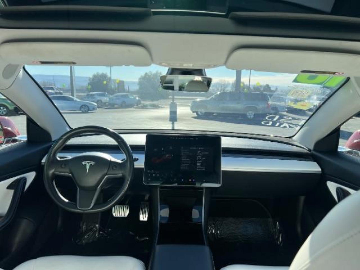 2018 Red Multi-Coat /White Tesla Model 3 Long Range (5YJ3E1EBXJF) with an ELECTRIC engine, Automatic transmission, located at 1865 East Red Hills Pkwy, St. George, 84770, (435) 628-0023, 37.120850, -113.543640 - Beautiful red on white model 3 Long range with Full Self Driving software PAID FOR! ($8k value) and Acceleration boost PAID FOR ($2k value). Every Tesla we sell comes with a charger. Not even Tesla does that! Great condition, Excellent battery health 280 on full charge. Full Tesla motor and batte - Photo#23