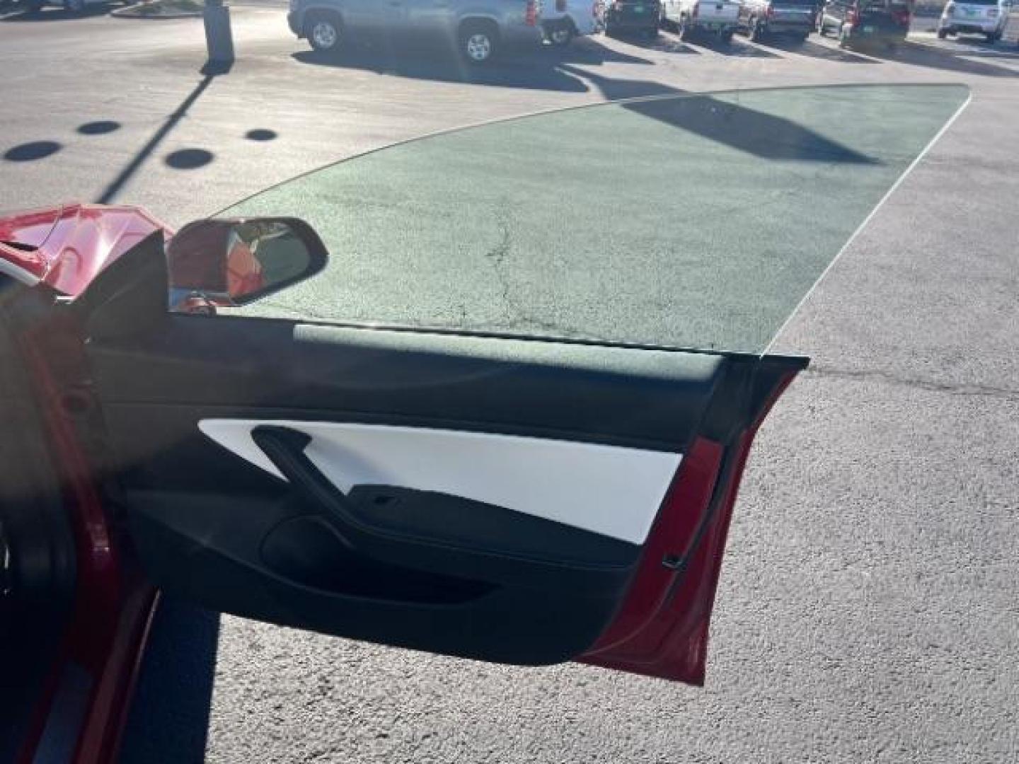 2018 Red Multi-Coat /White Tesla Model 3 Long Range (5YJ3E1EBXJF) with an ELECTRIC engine, Automatic transmission, located at 1865 East Red Hills Pkwy, St. George, 84770, (435) 628-0023, 37.120850, -113.543640 - Beautiful red on white model 3 Long range with Full Self Driving software PAID FOR! ($8k value) and Acceleration boost PAID FOR ($2k value). Every Tesla we sell comes with a charger. Not even Tesla does that! Great condition, Excellent battery health 280 on full charge. Full Tesla motor and batte - Photo#27