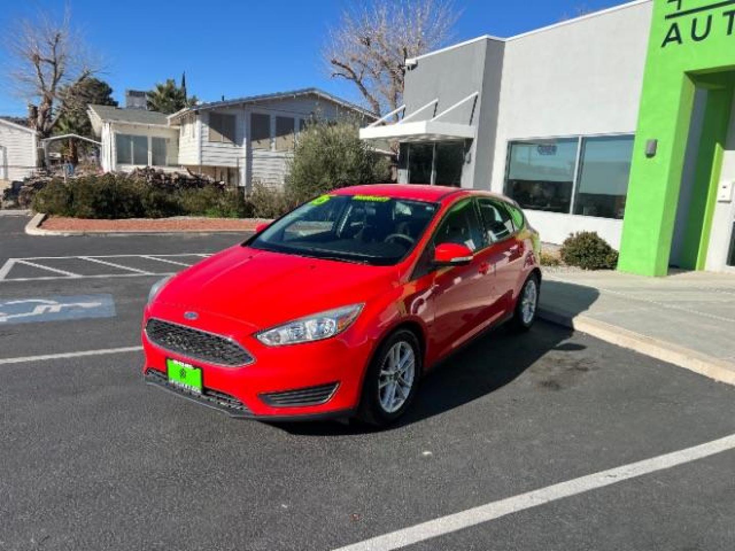 2015 Race Red /Charcoal Black Ford Focus SE (1FADP3K28FL) with an 2L I-4 gasoline direct injection engine, Automatic transmission, located at 1865 East Red Hills Pkwy, St. George, 84770, (435) 628-0023, 37.120850, -113.543640 - We specialize in helping ALL people get the best financing available. No matter your credit score, good, bad or none we can get you an amazing rate. Had a bankruptcy, divorce, or repossessions? We give you the green light to get your credit back on the road. Low down and affordable payments that fit - Photo#2