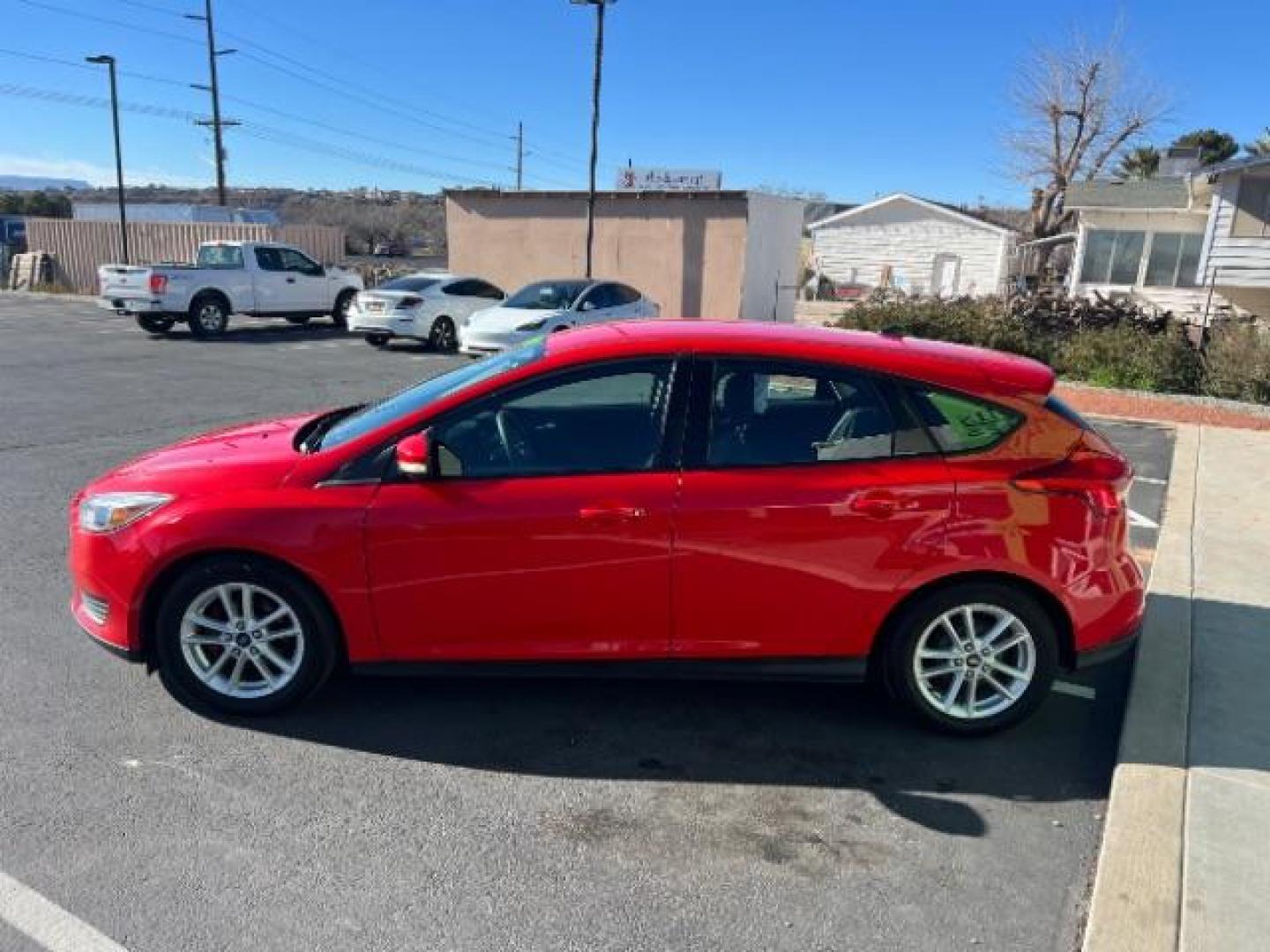2015 Race Red /Charcoal Black Ford Focus SE (1FADP3K28FL) with an 2L I-4 gasoline direct injection engine, Automatic transmission, located at 1865 East Red Hills Pkwy, St. George, 84770, (435) 628-0023, 37.120850, -113.543640 - We specialize in helping ALL people get the best financing available. No matter your credit score, good, bad or none we can get you an amazing rate. Had a bankruptcy, divorce, or repossessions? We give you the green light to get your credit back on the road. Low down and affordable payments that fit - Photo#3